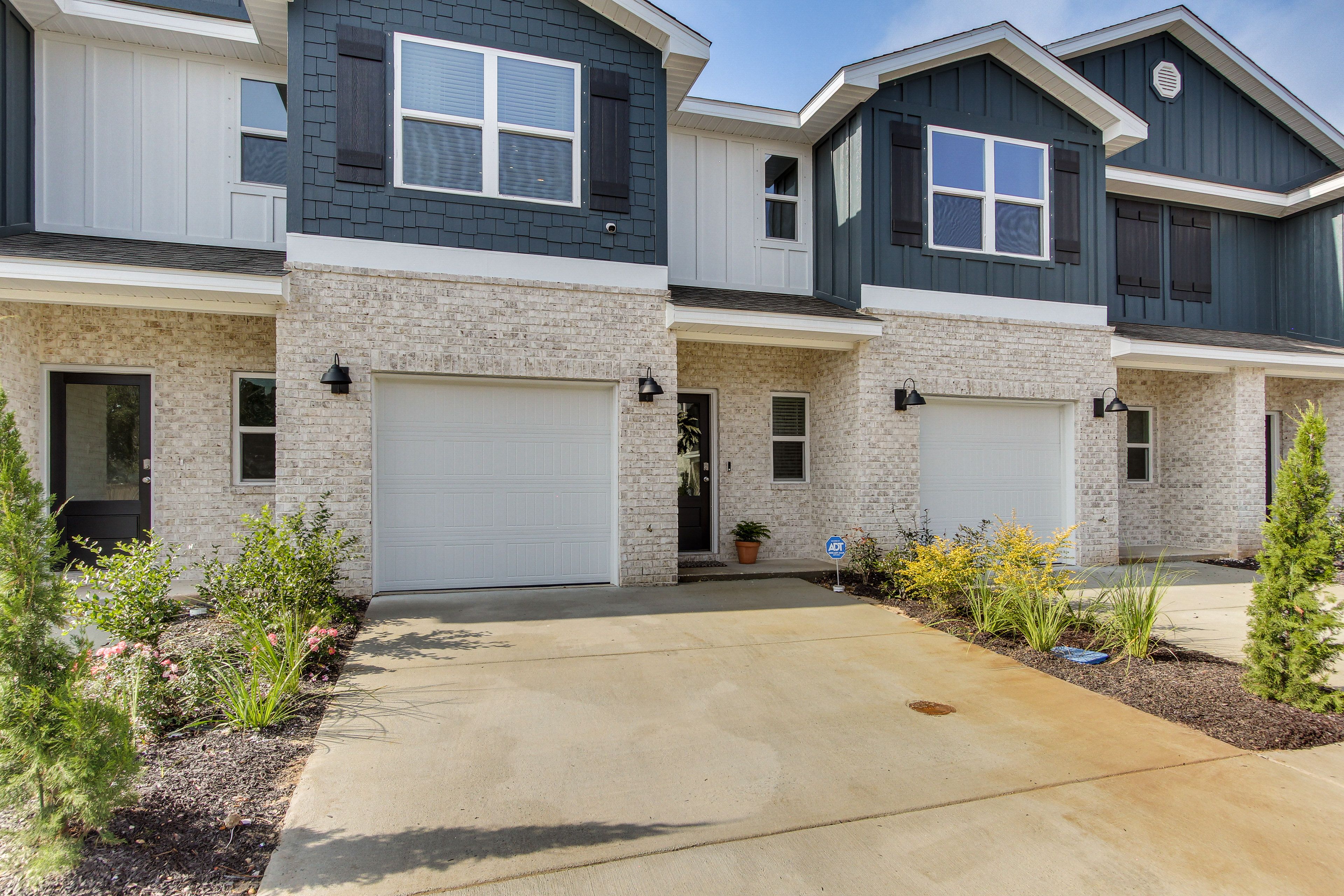 Townhome Exterior | Parking | Driveway (2 Vehicles)