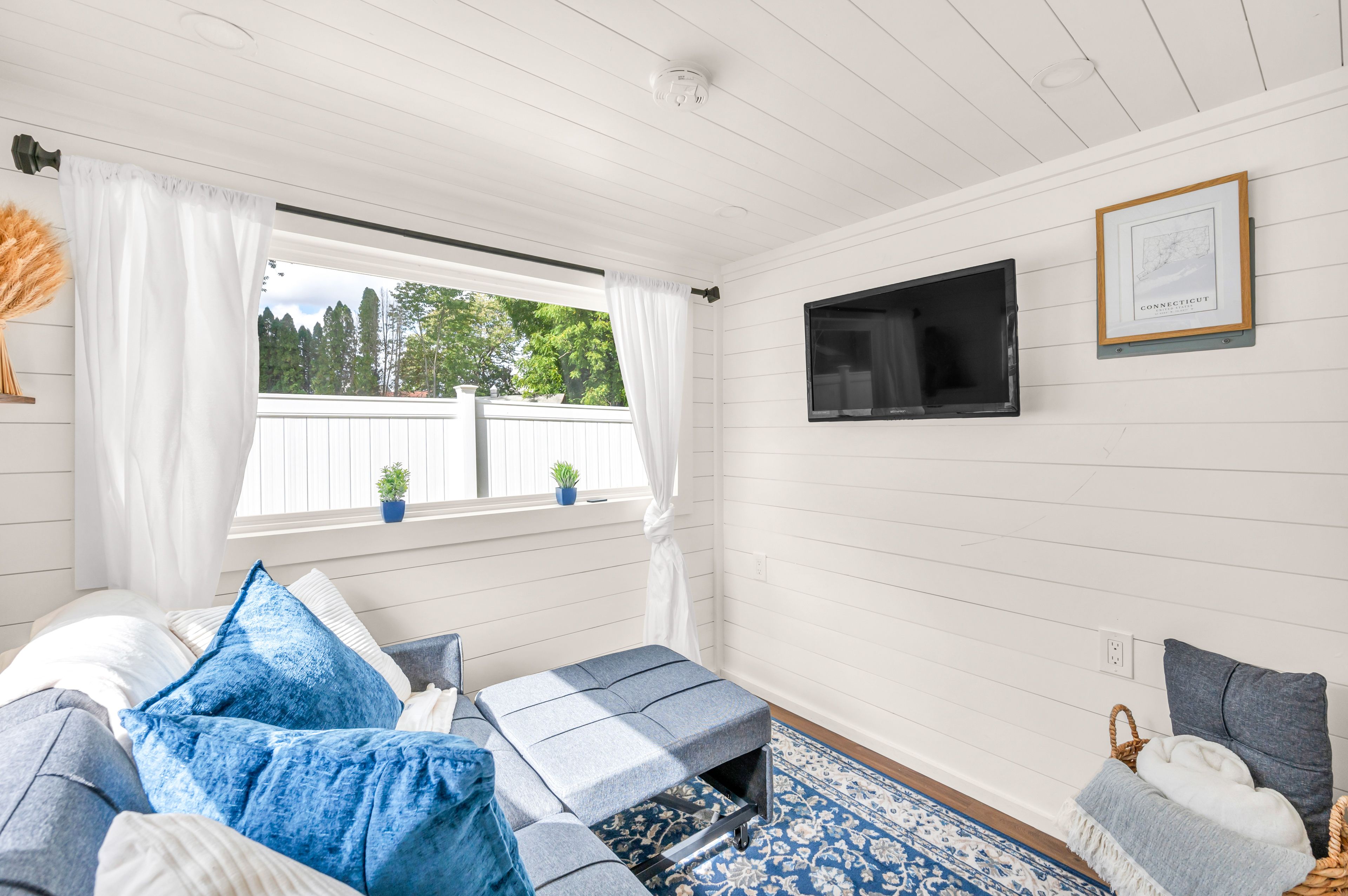 Living Area | Flat-Screen TV | Single-Story Tiny Home w/ Loft