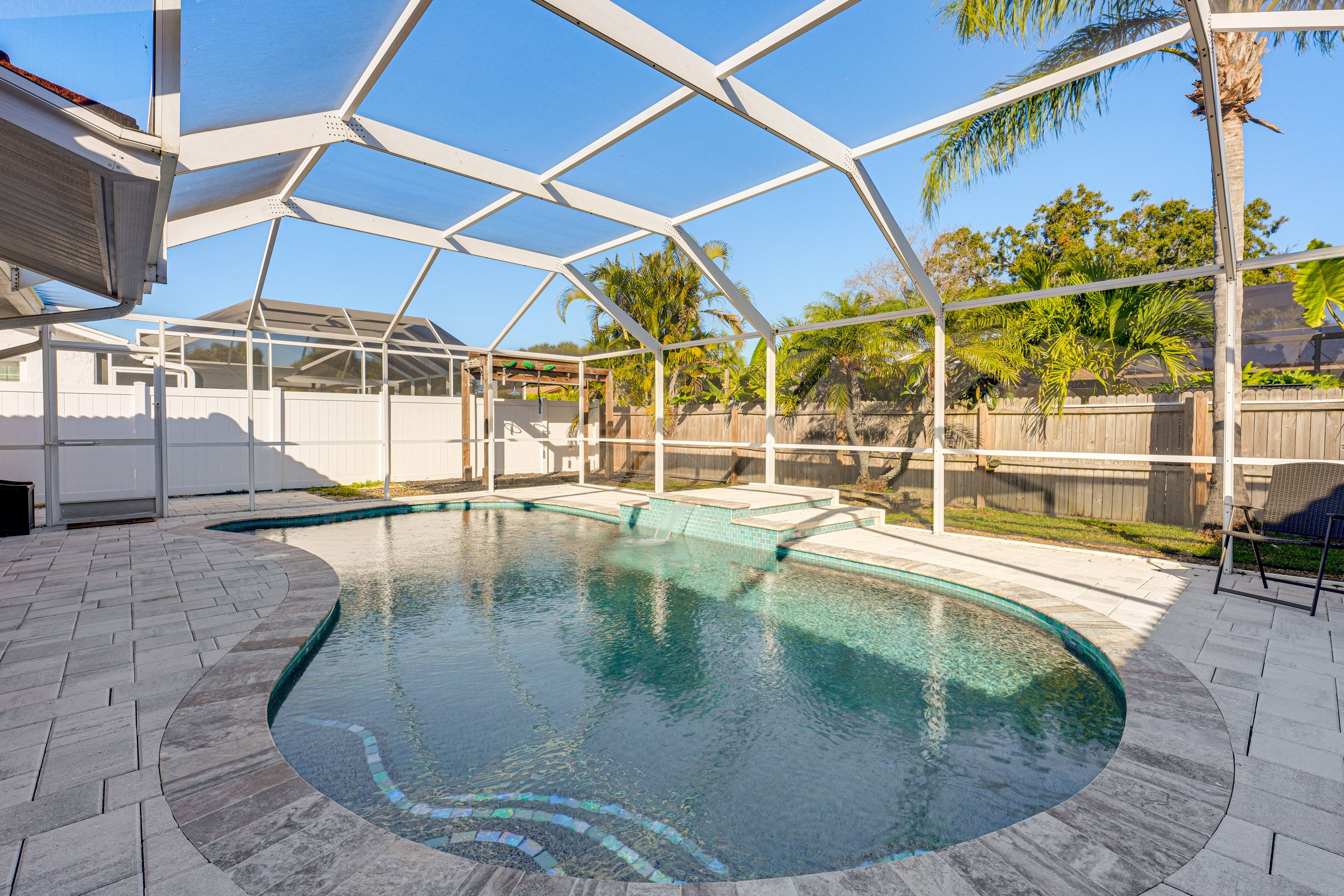 Screened Lanai | Private Pool (Heated w/ Fee) | Patio Area | Outdoor Seating