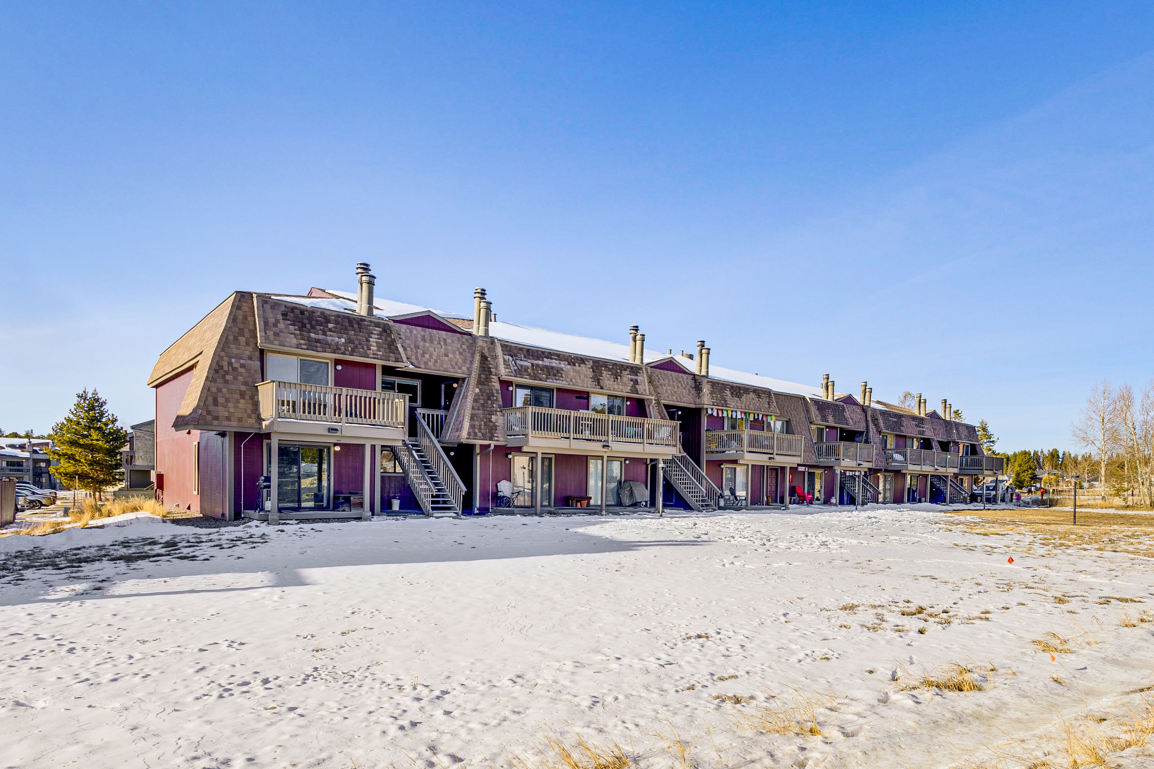 Property Exterior | Community Lot (2 Vehicles; First-Come, First-Served)