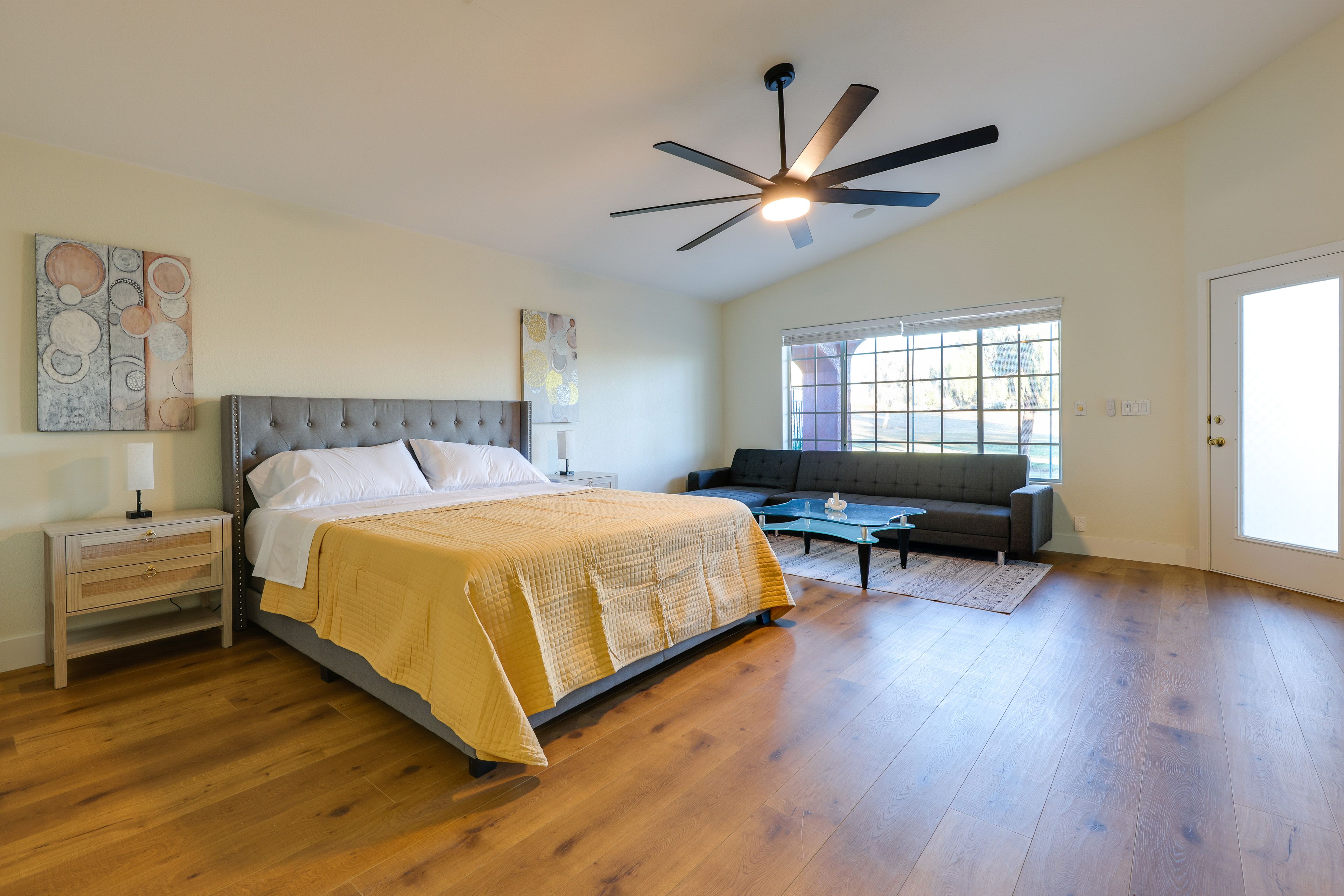 Bedroom 1 | King Bed | Full Sleeper Sofa | Smart TV | Patio Access