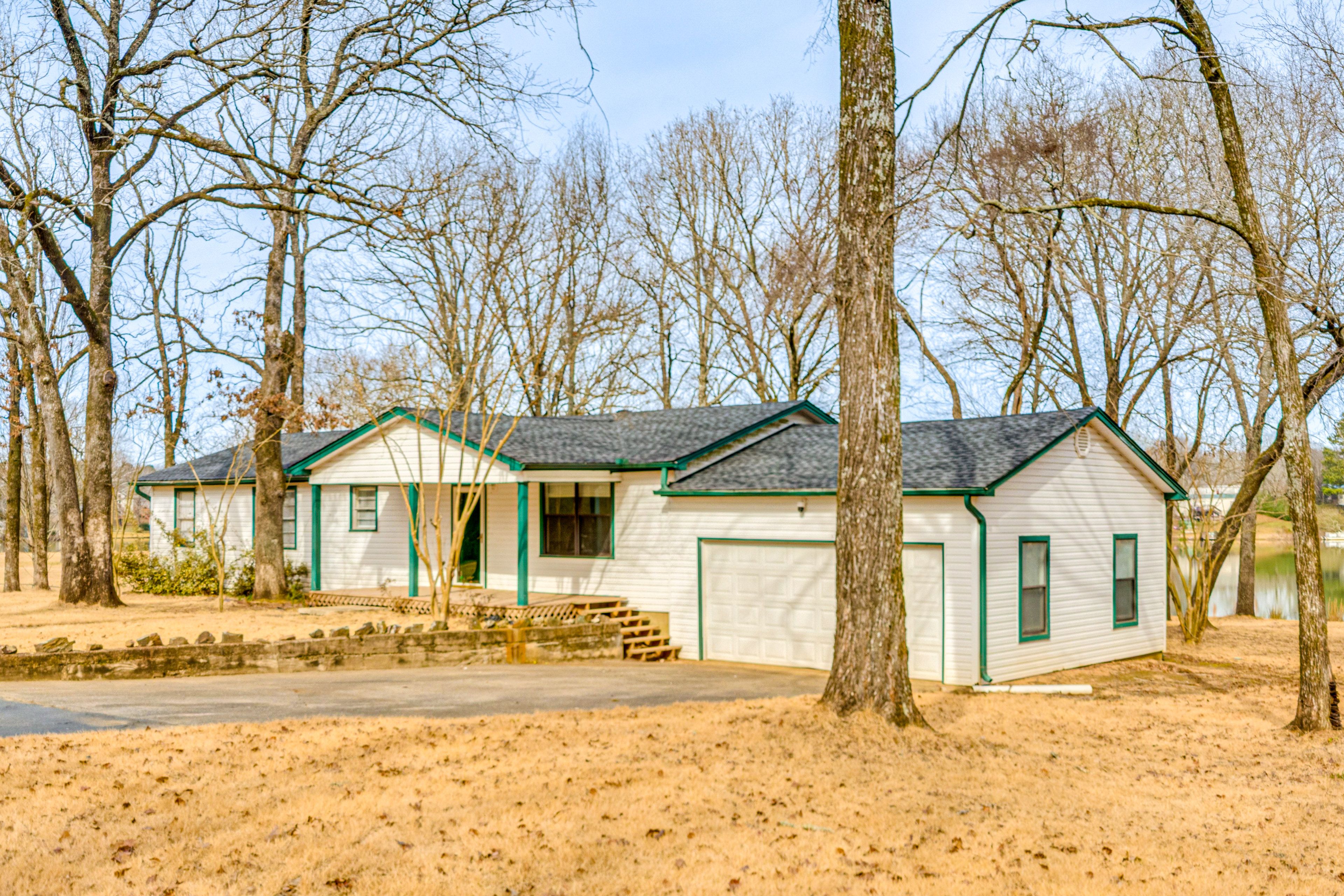 Property Exterior | Furnished Deck | Quiet Surroundings | Spacious Yard