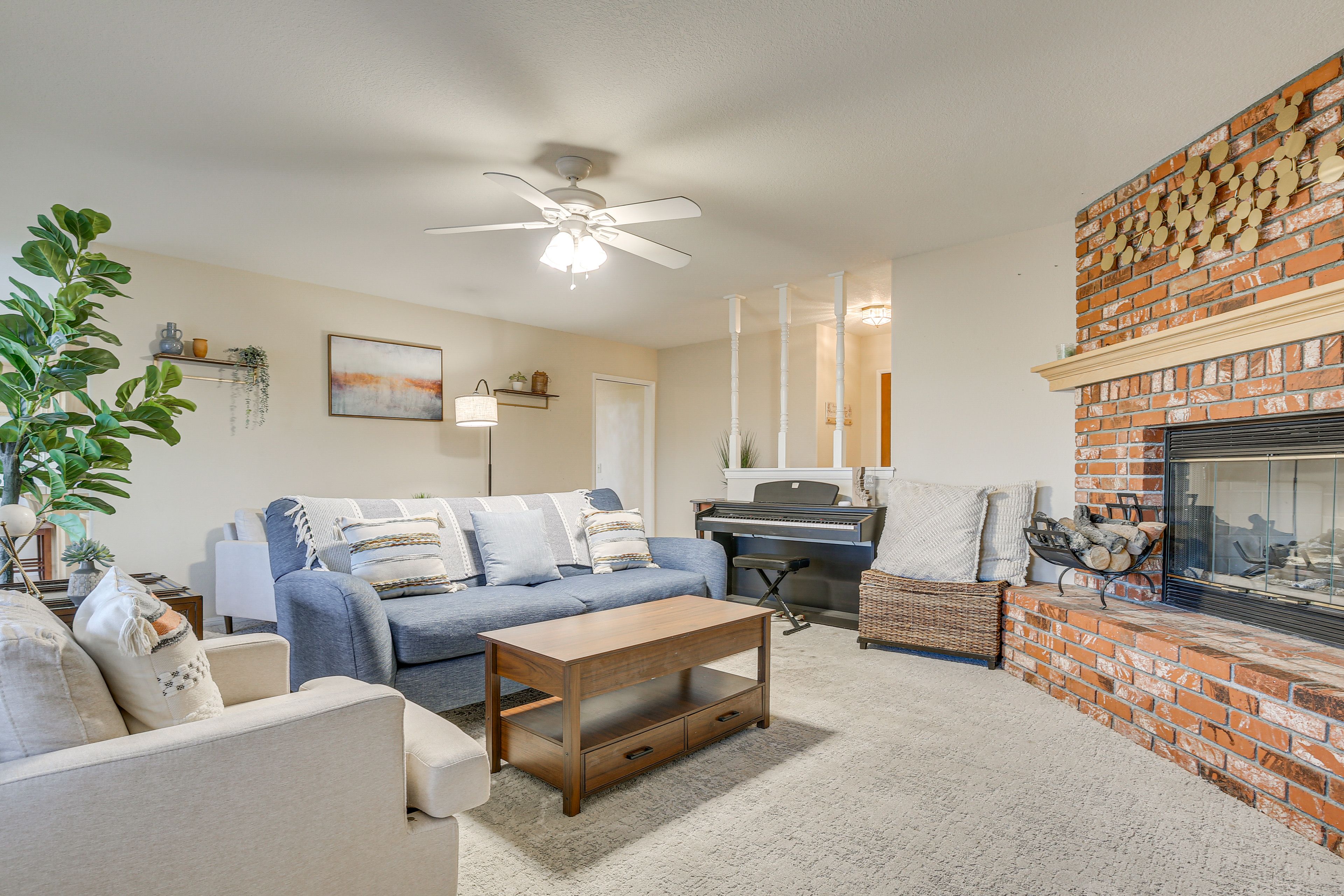 Living Area | TV | Wood-Burning Fireplace | Piano
