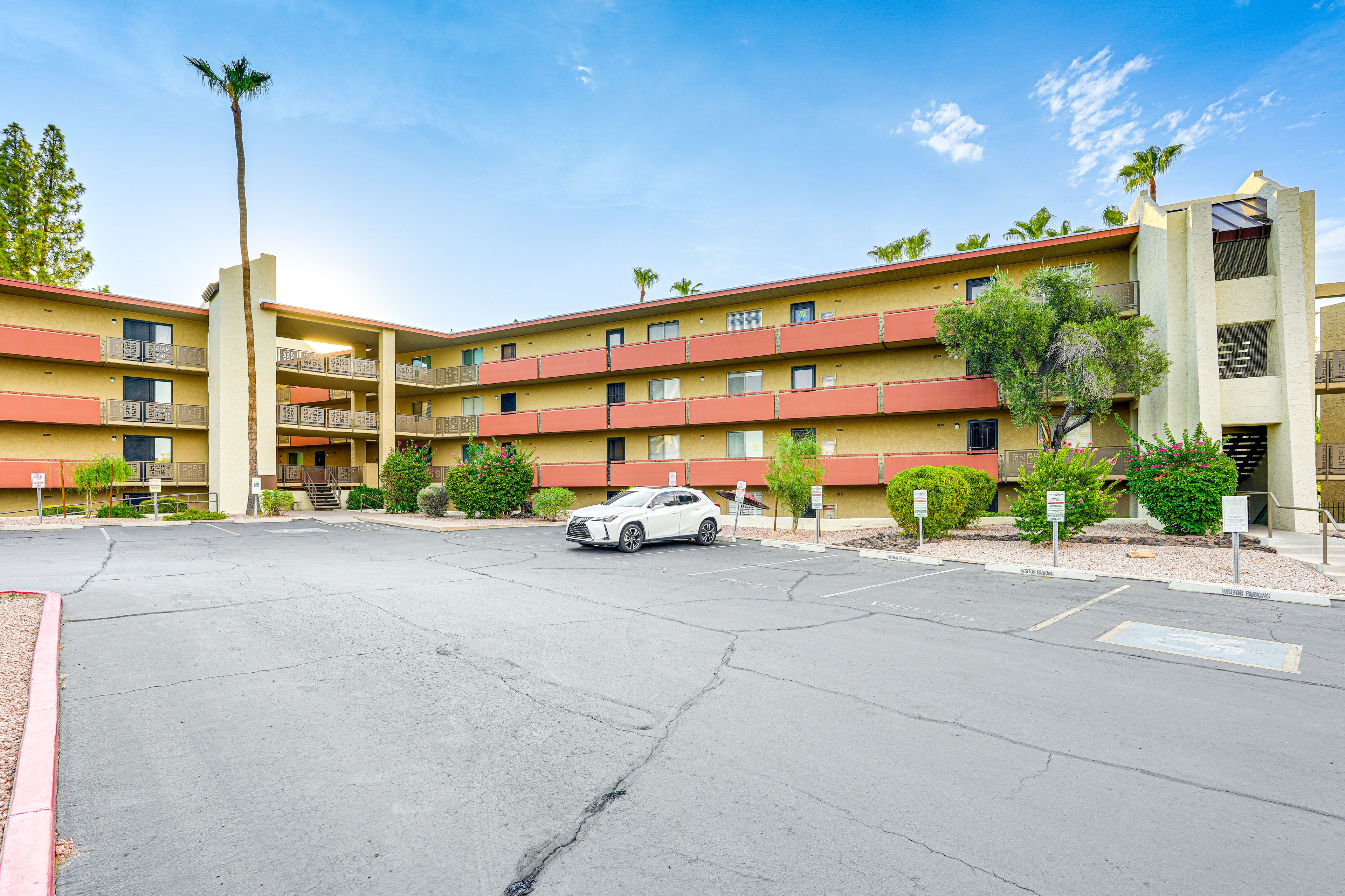 Property Exterior | Designated Parking Spot (1 Vehicle) | Visitor Parking