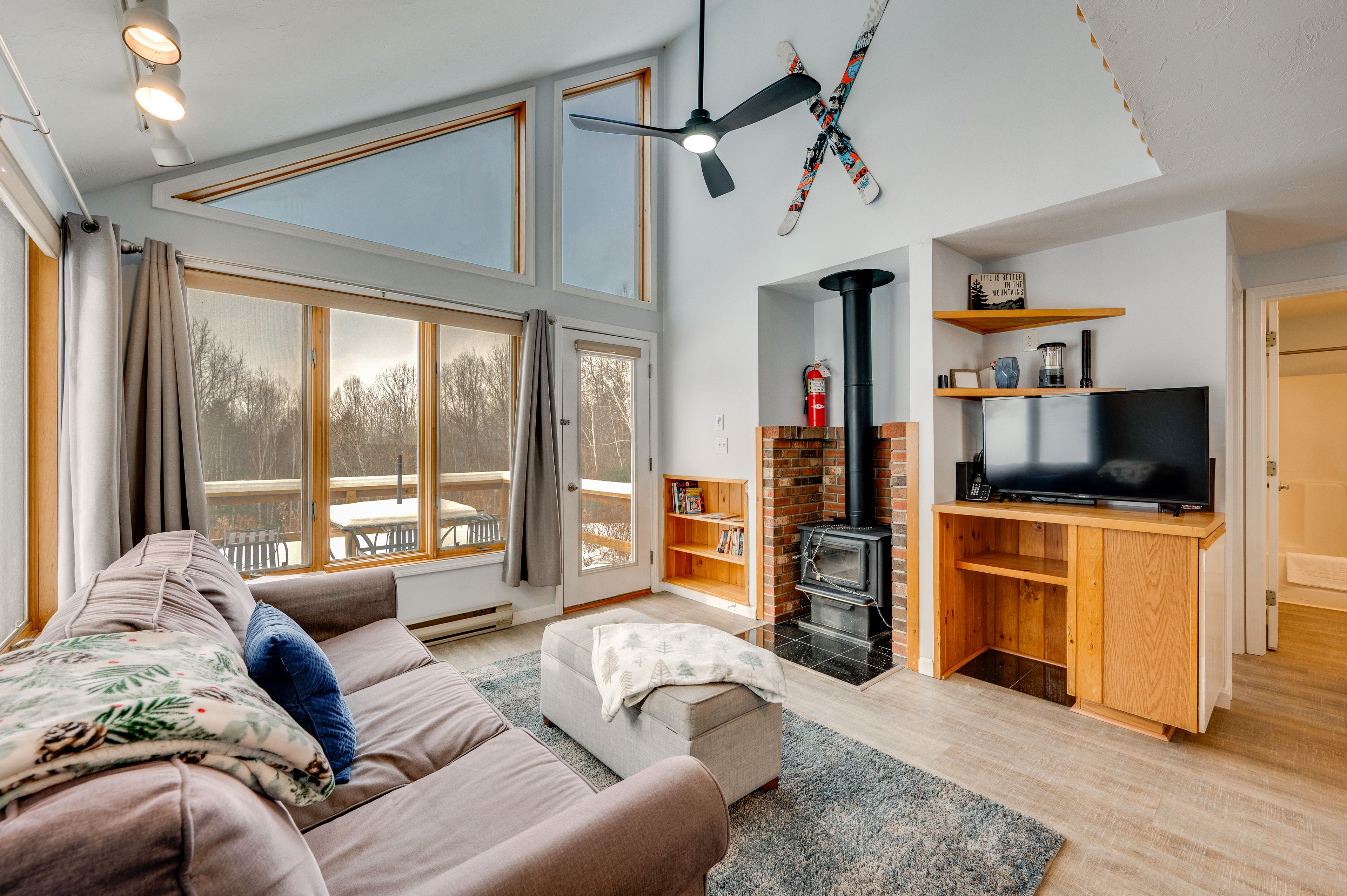 Living Room | Queen Sleeper Sofa | Decorative Wood-Burning Stove | 1st Floor