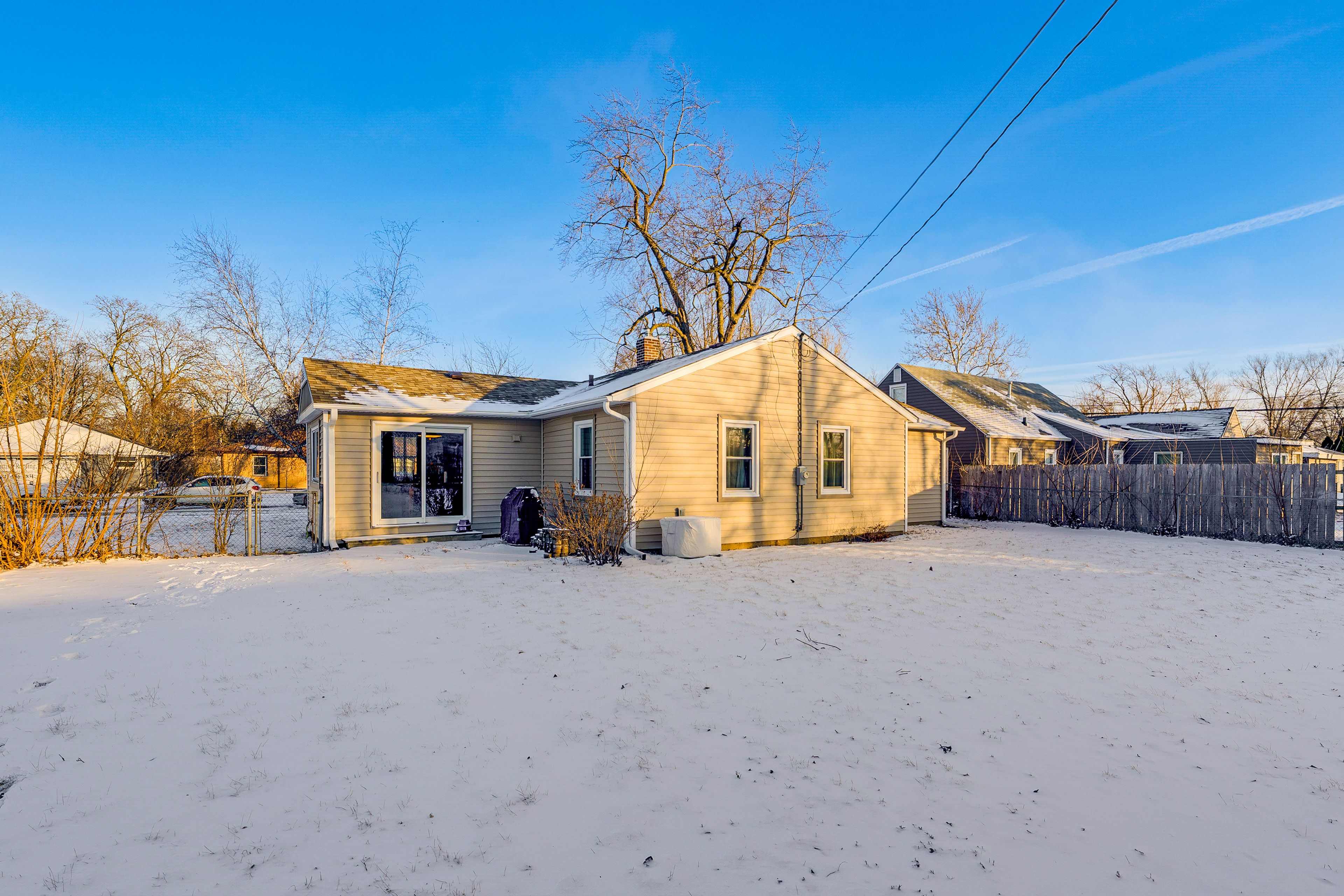 House Exterior | Fenced Backyard | Dining Area