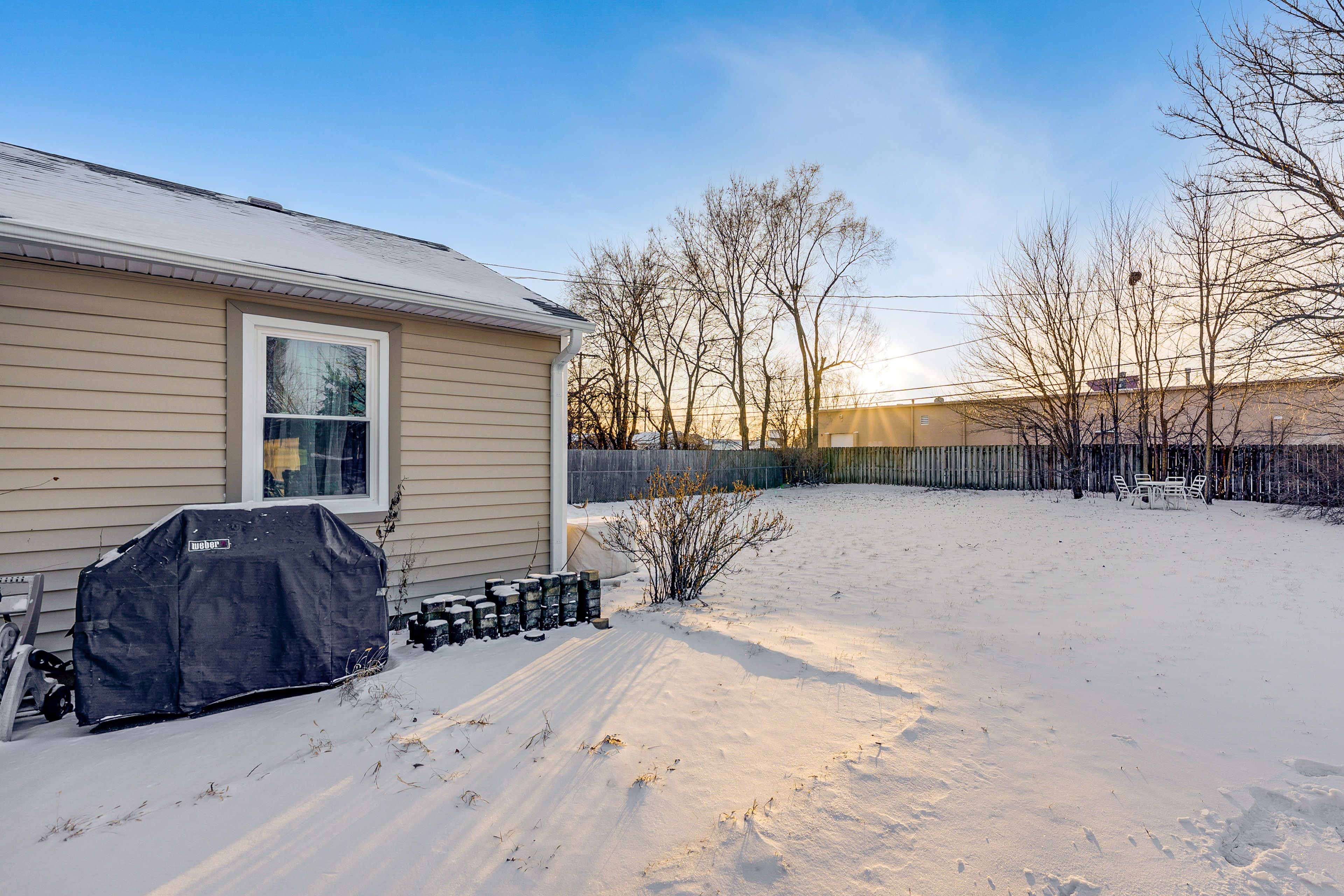 House Exterior | Gas Grill | Dining Area | Fenced Backyard