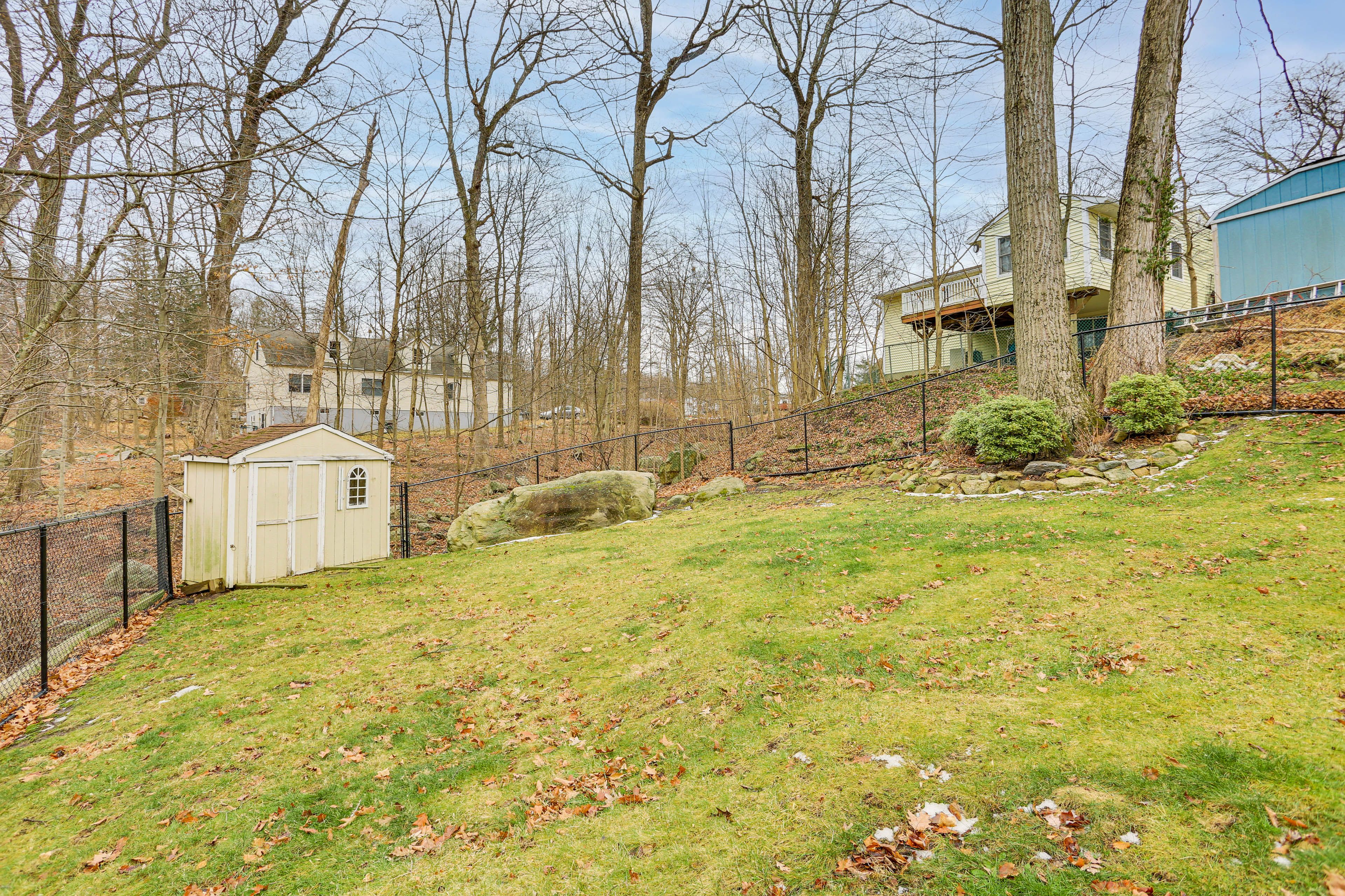 Fenced-In Backyard (On a Slope)