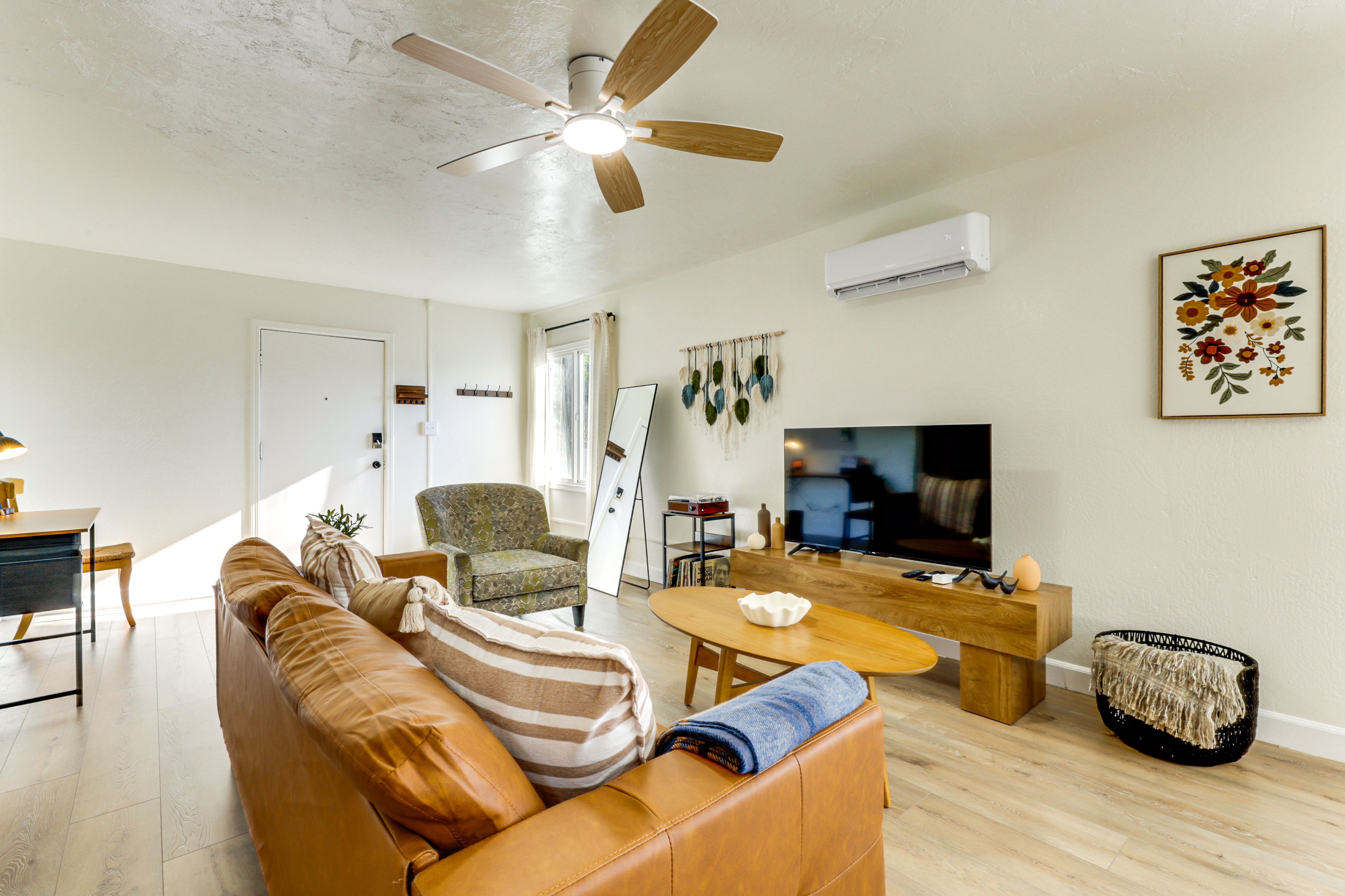 Living Area | Smart TV | Laptop Workspace | Books | Free WiFi