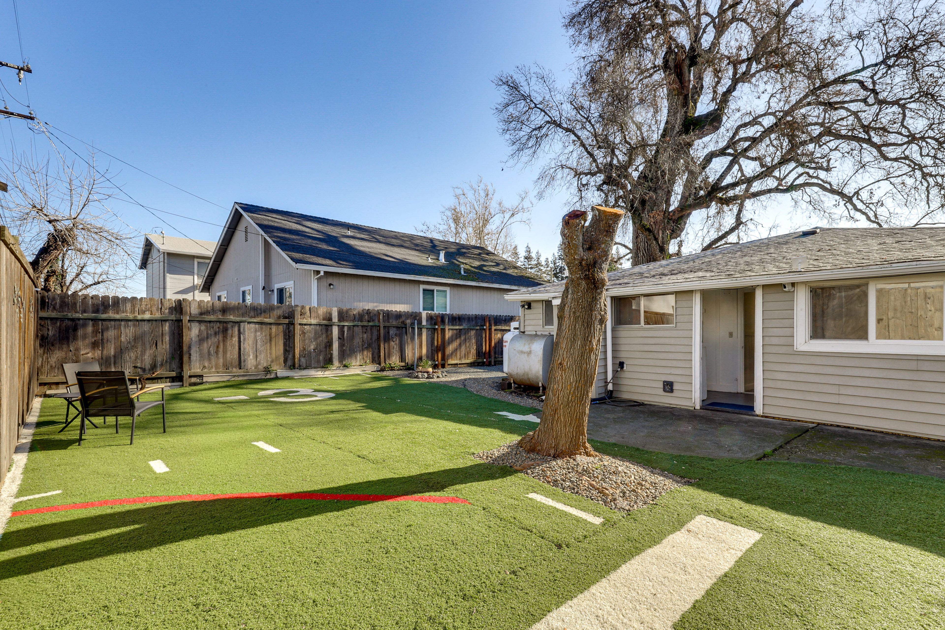 House Exterior | Fenced Backyard w/ Seating