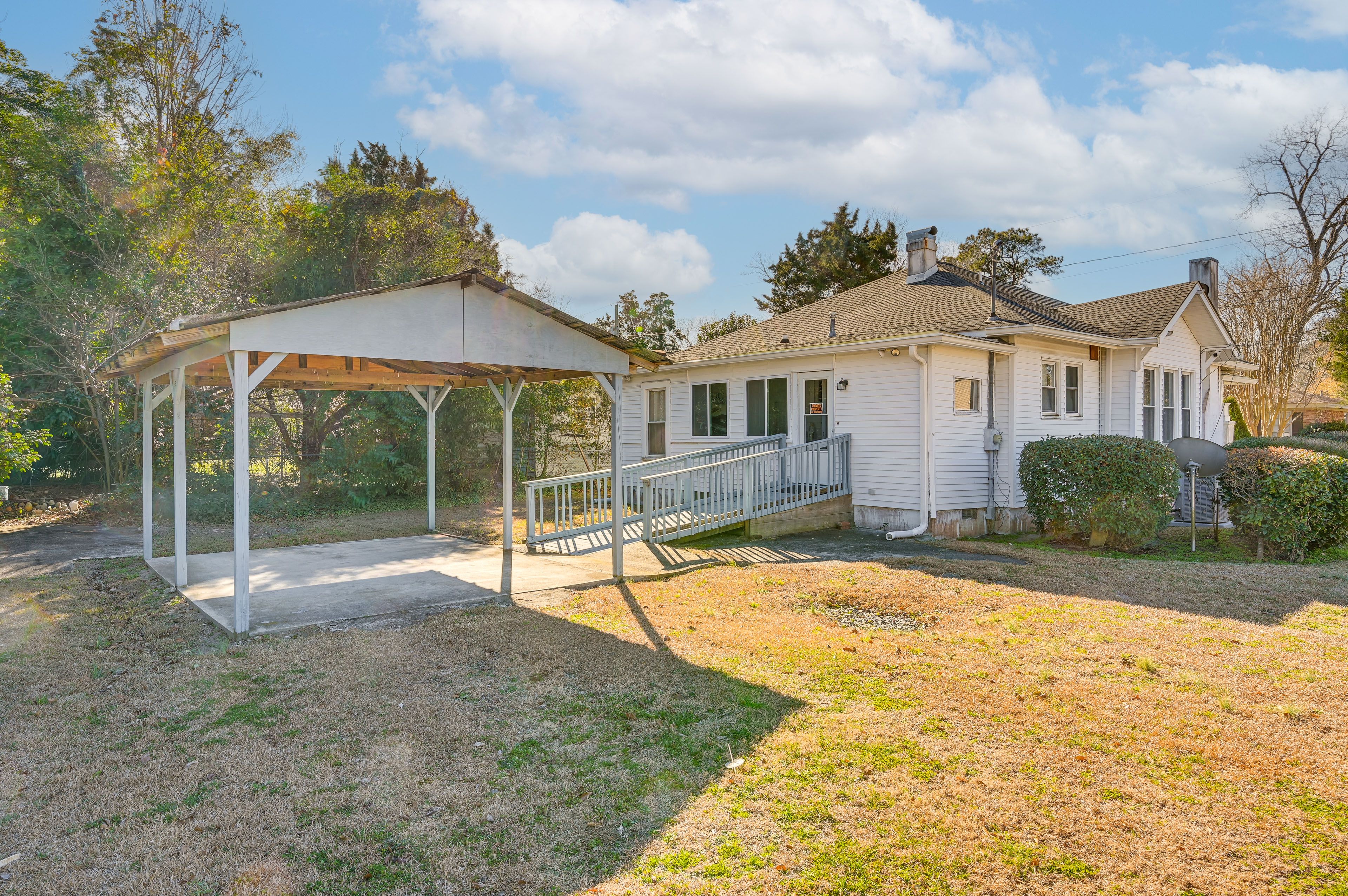 Parking | Carport (1 Vehicle) | Backyard (2 Vehicles)