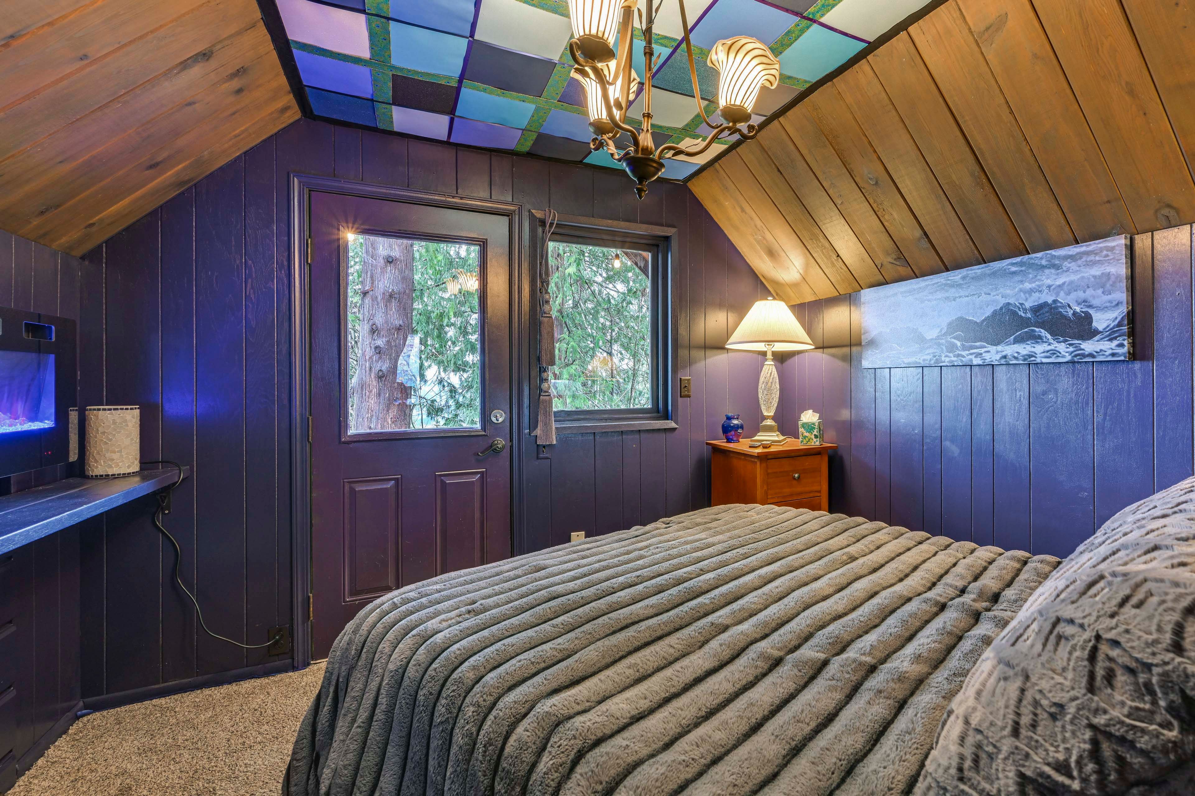 Bedroom 1 | 2nd Floor | Queen Bed | Electric Fireplace | Balcony Access