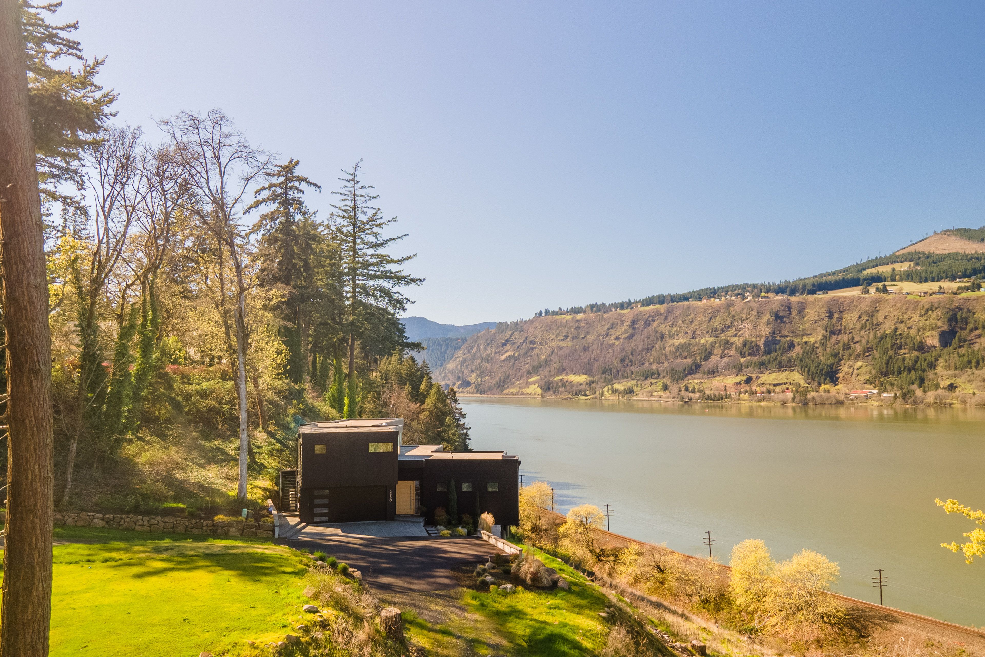 Modern Riverfront Retreat with Unforgettable Views
