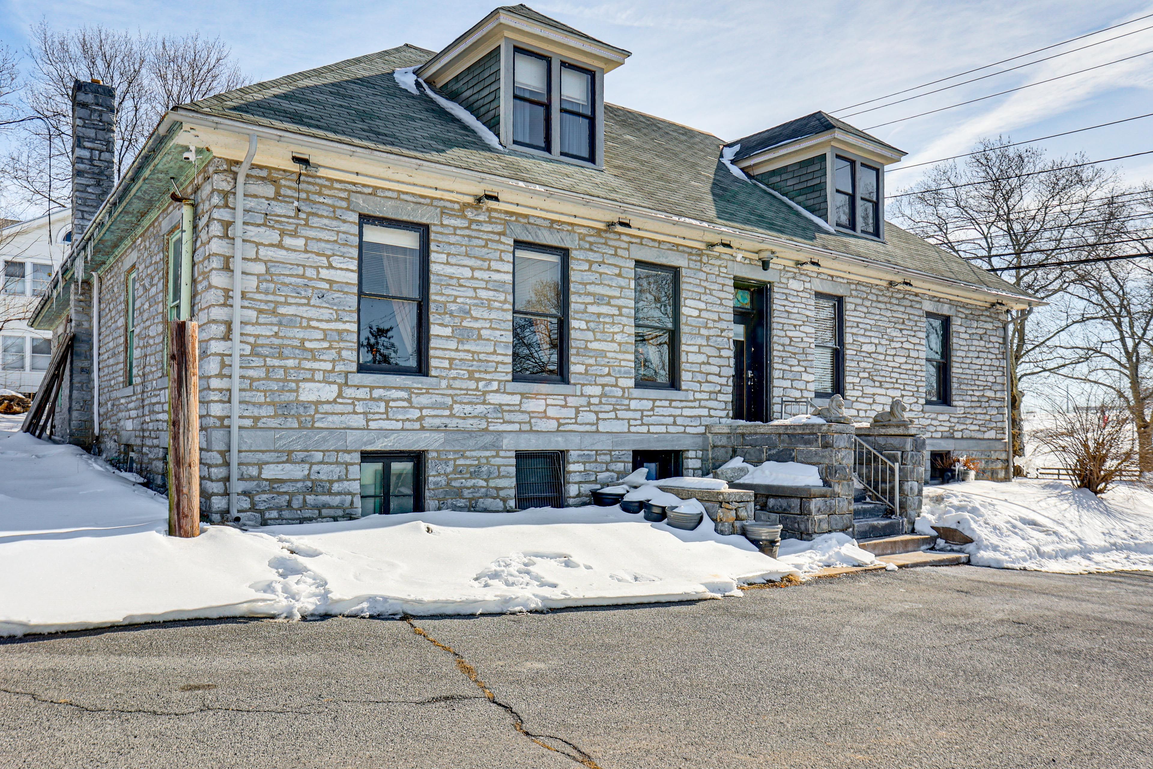 Property Exterior | Surface Lot (5 Vehicles)