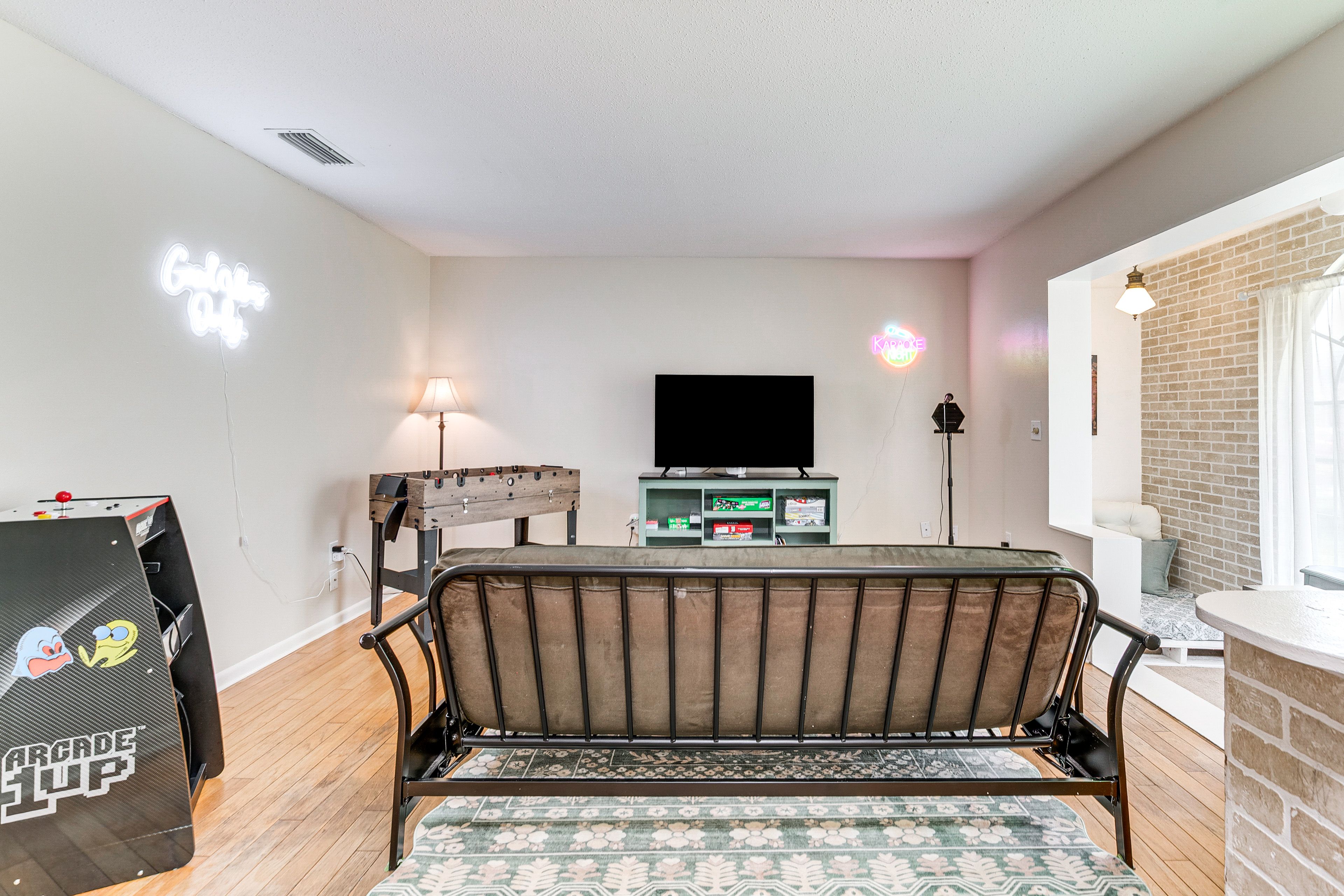 Game Room | Queen Futon | Projecting PacMan | Foosball Table | Board Games