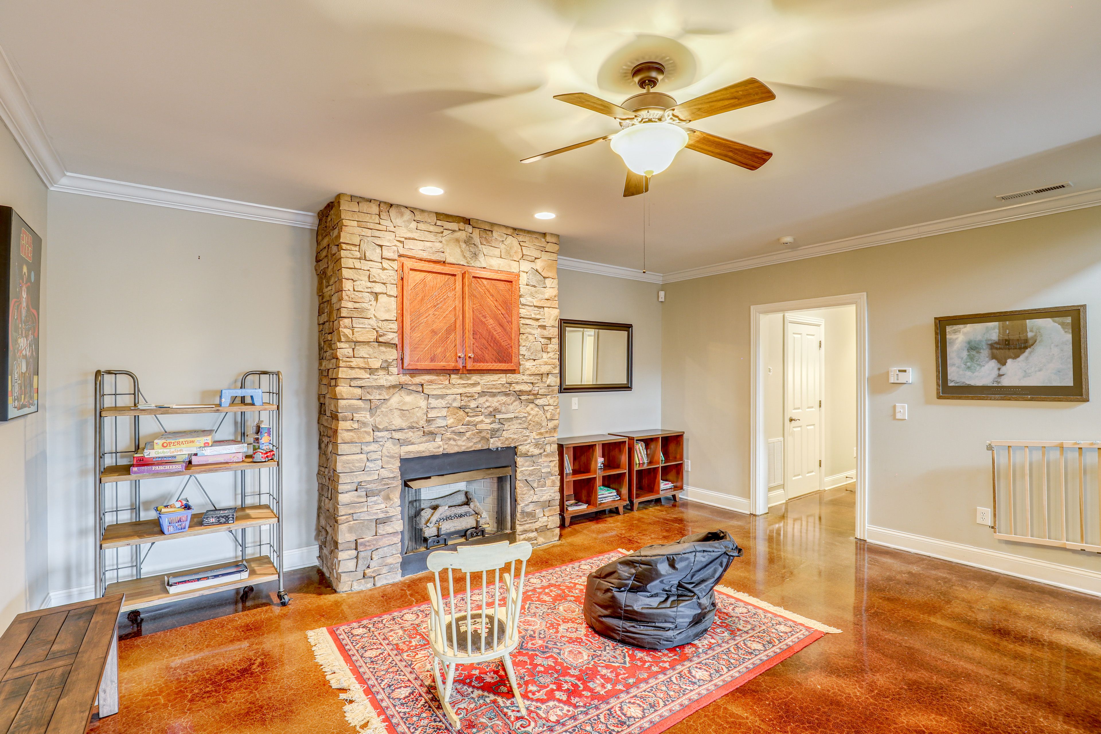 Lower Living Area | Fireplace | Books | Board Games | Lower Floor