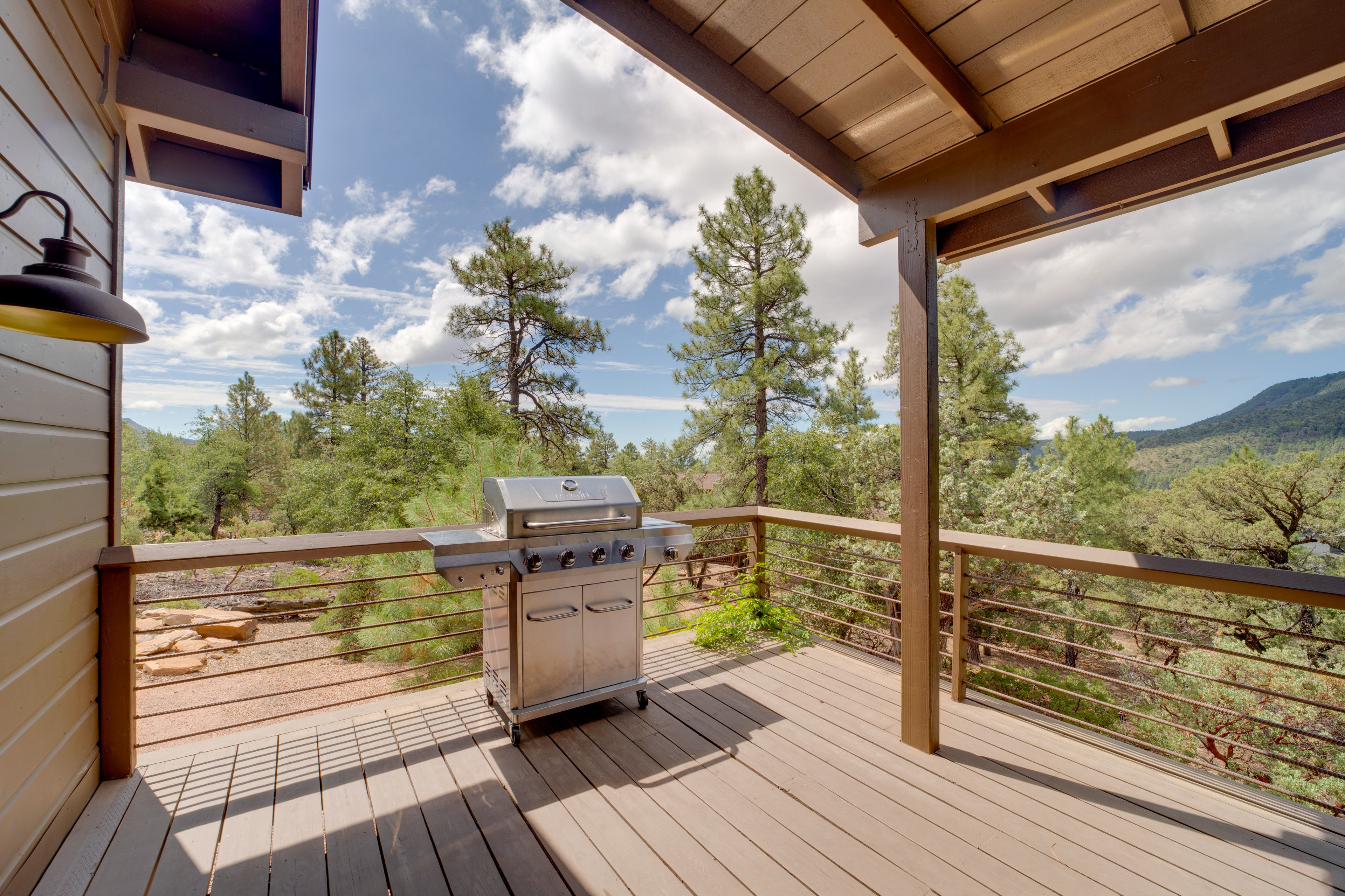 Covered Deck | Gas Grill | Outdoor Dining & Lounge Areas | Mountain Views