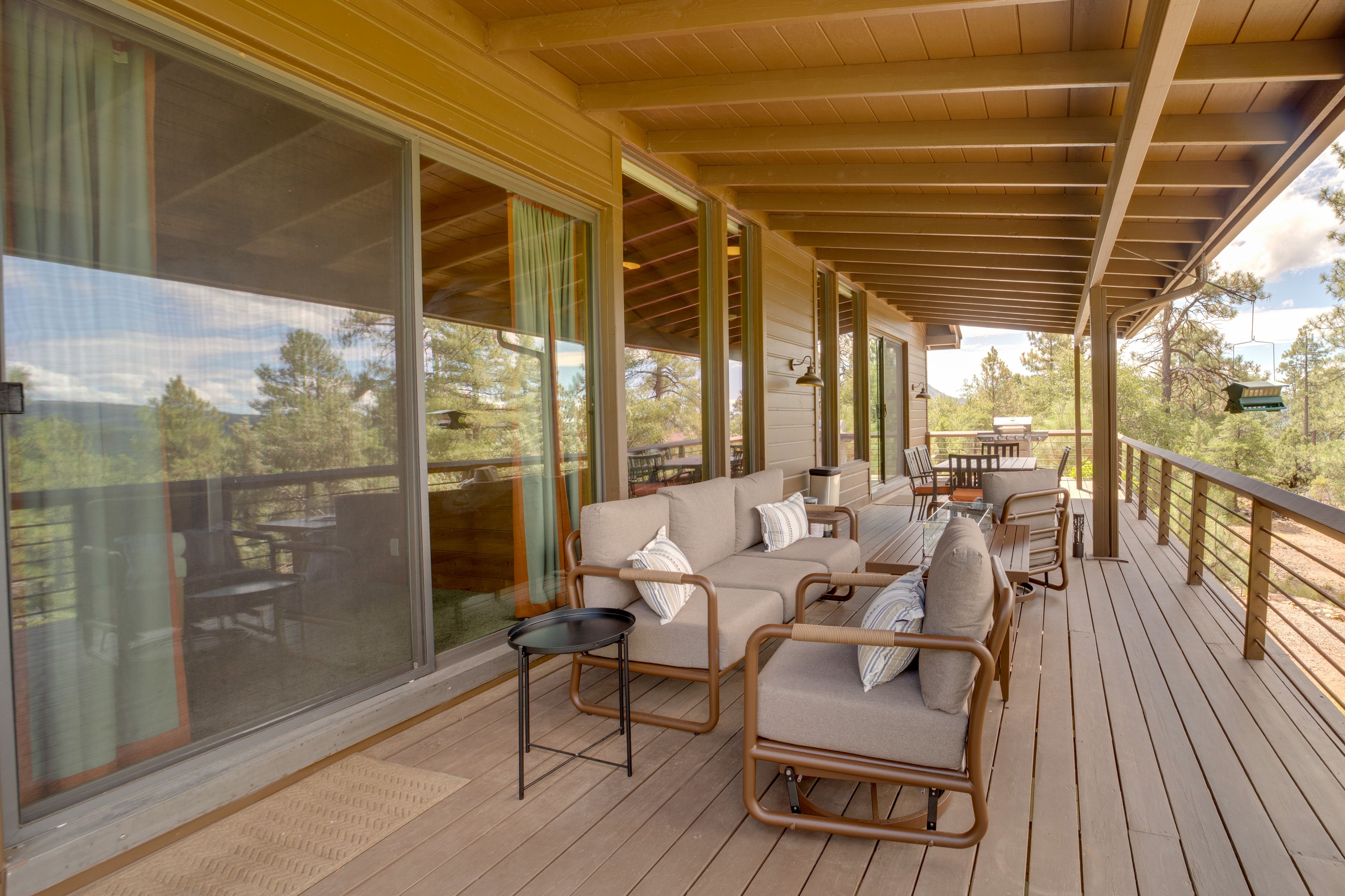 Covered Deck | Lounge & Dining Area | Gas Grill