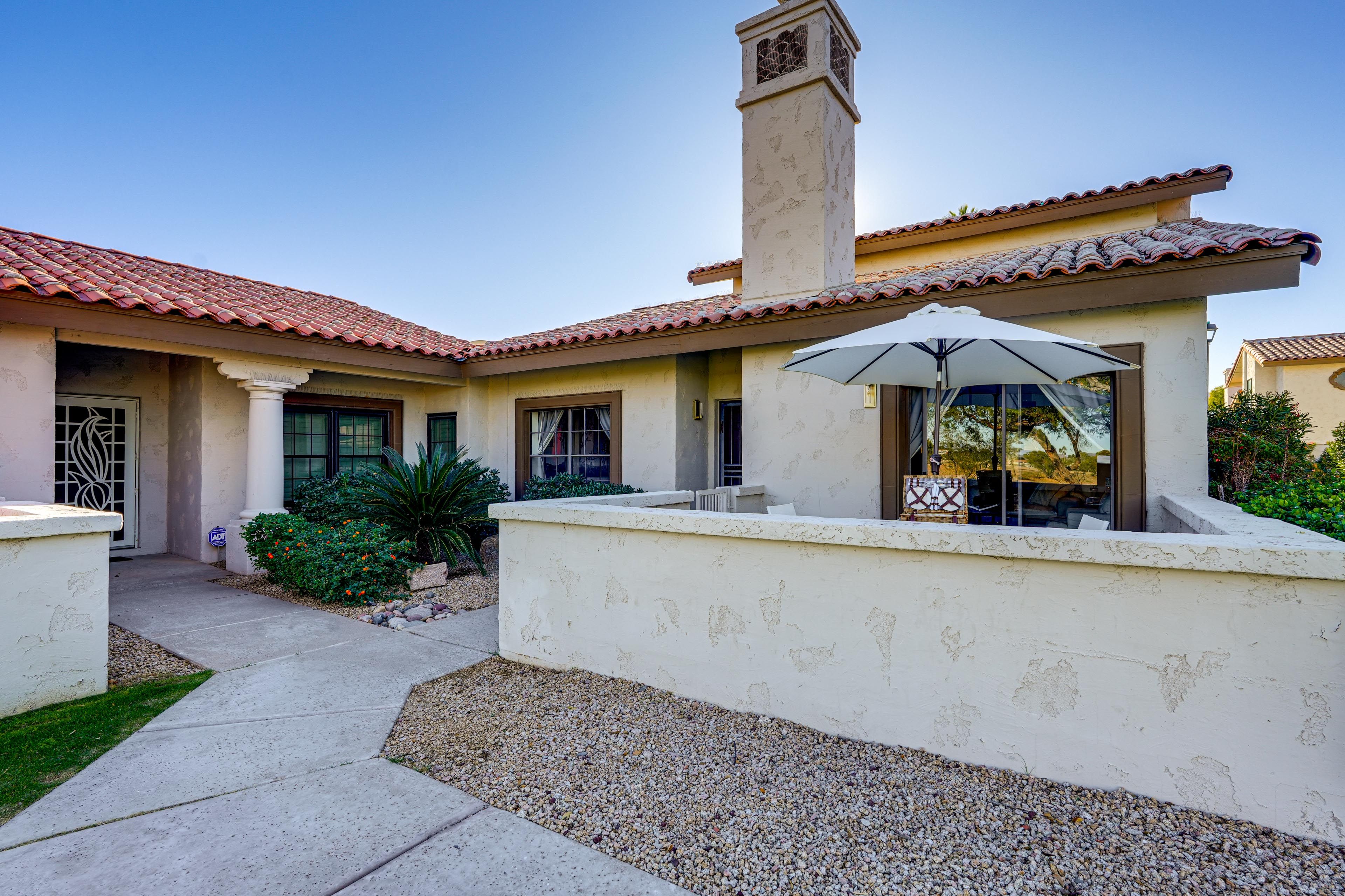 Townhouse Exterior | Private Patios | Dining Area | Lounge Seating