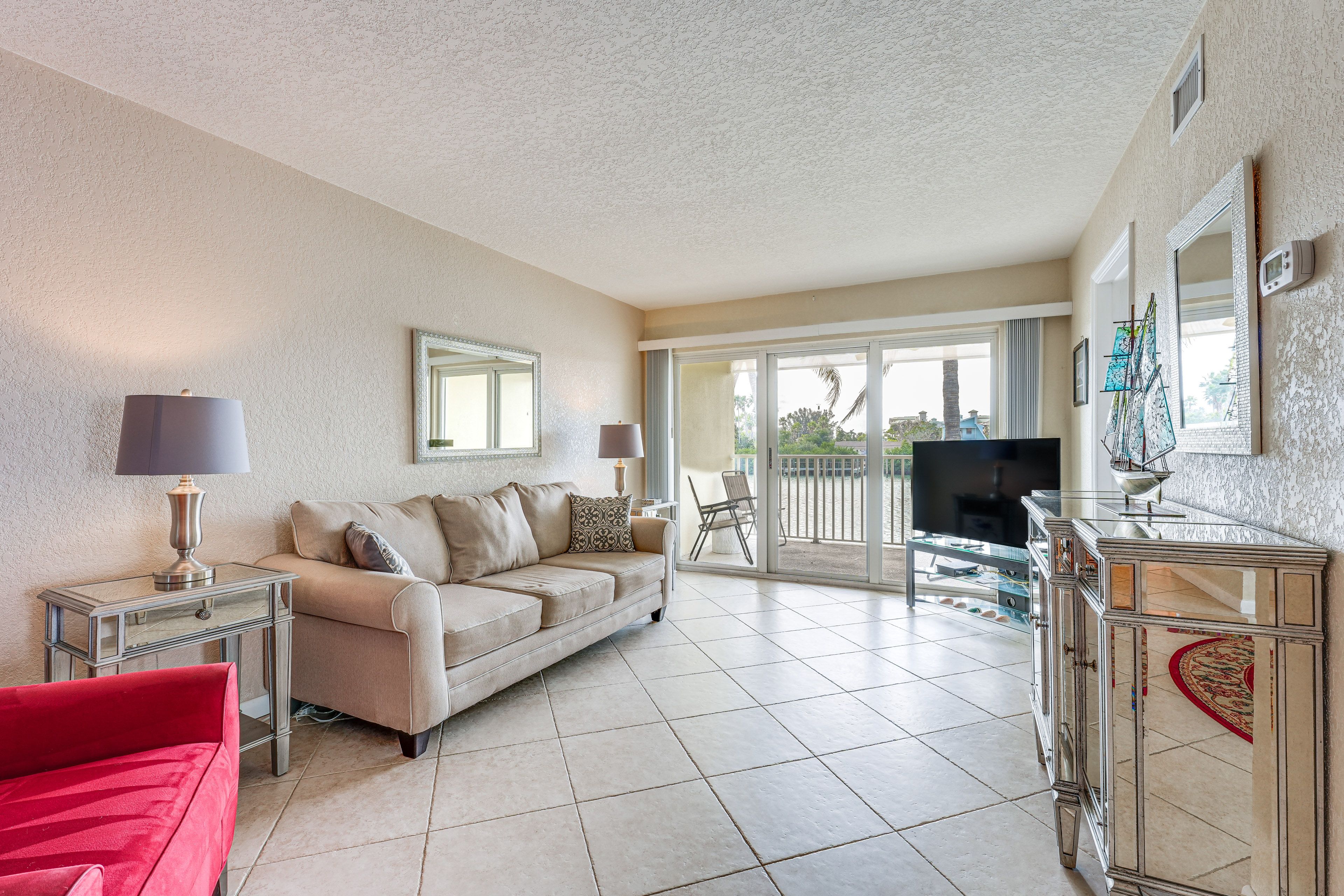 Treasure Island Vacation Rental | 2BR | 2BA | 1,051 Sq Ft | Stairs Required