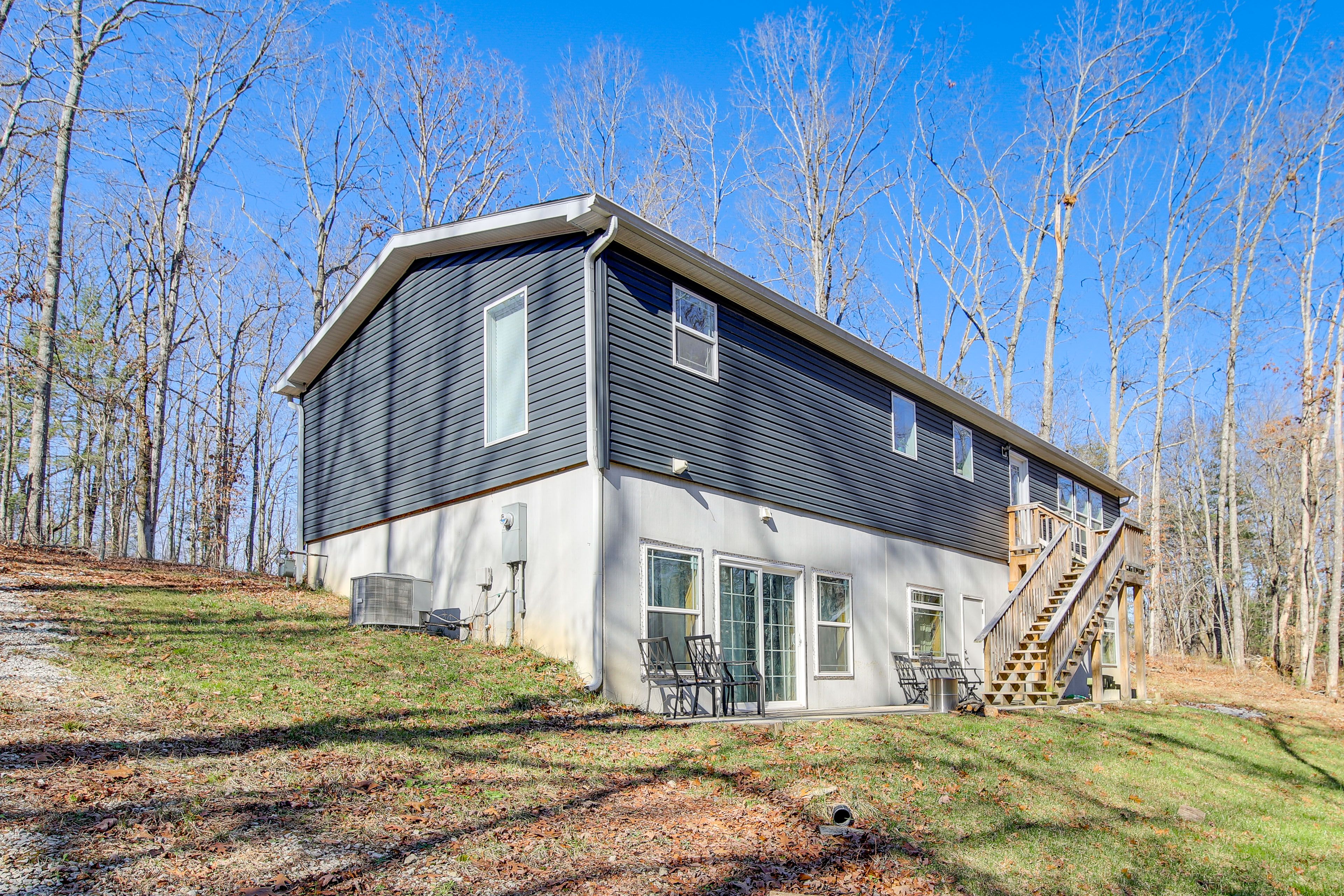 House Exterior | Patio w/ Seating | Private Yard | Creek Views & Access