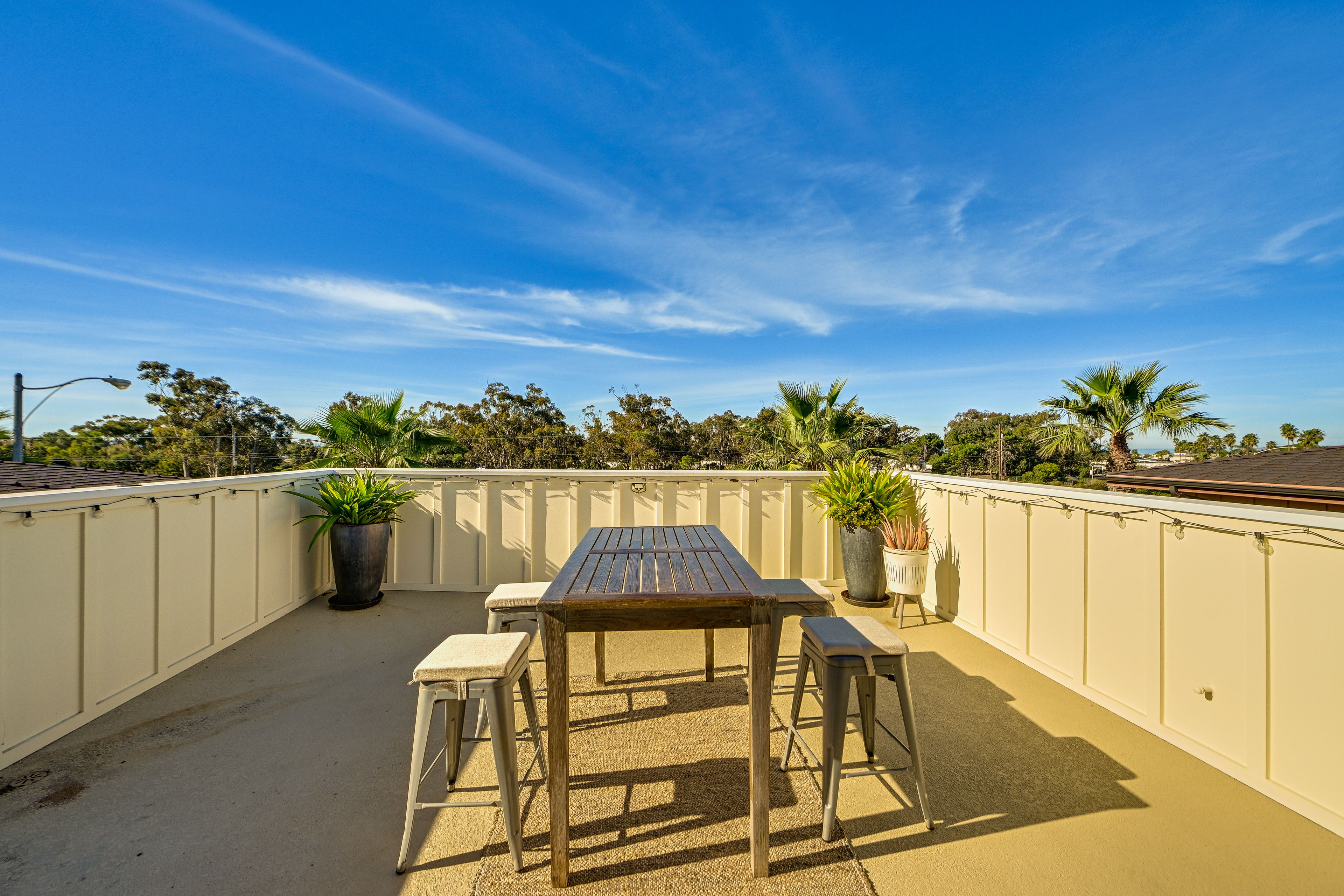 Townhome Exterior | Rooftop Patio | Dining Table