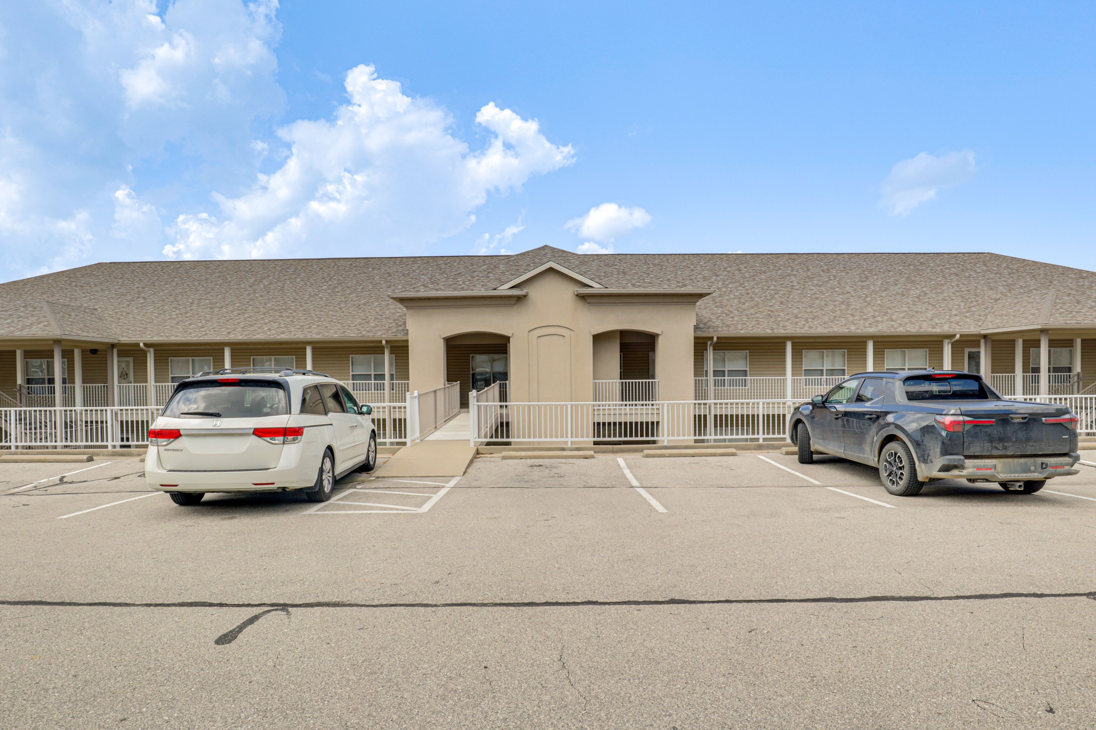 Community Parking Lot (First-Come, First-Served)