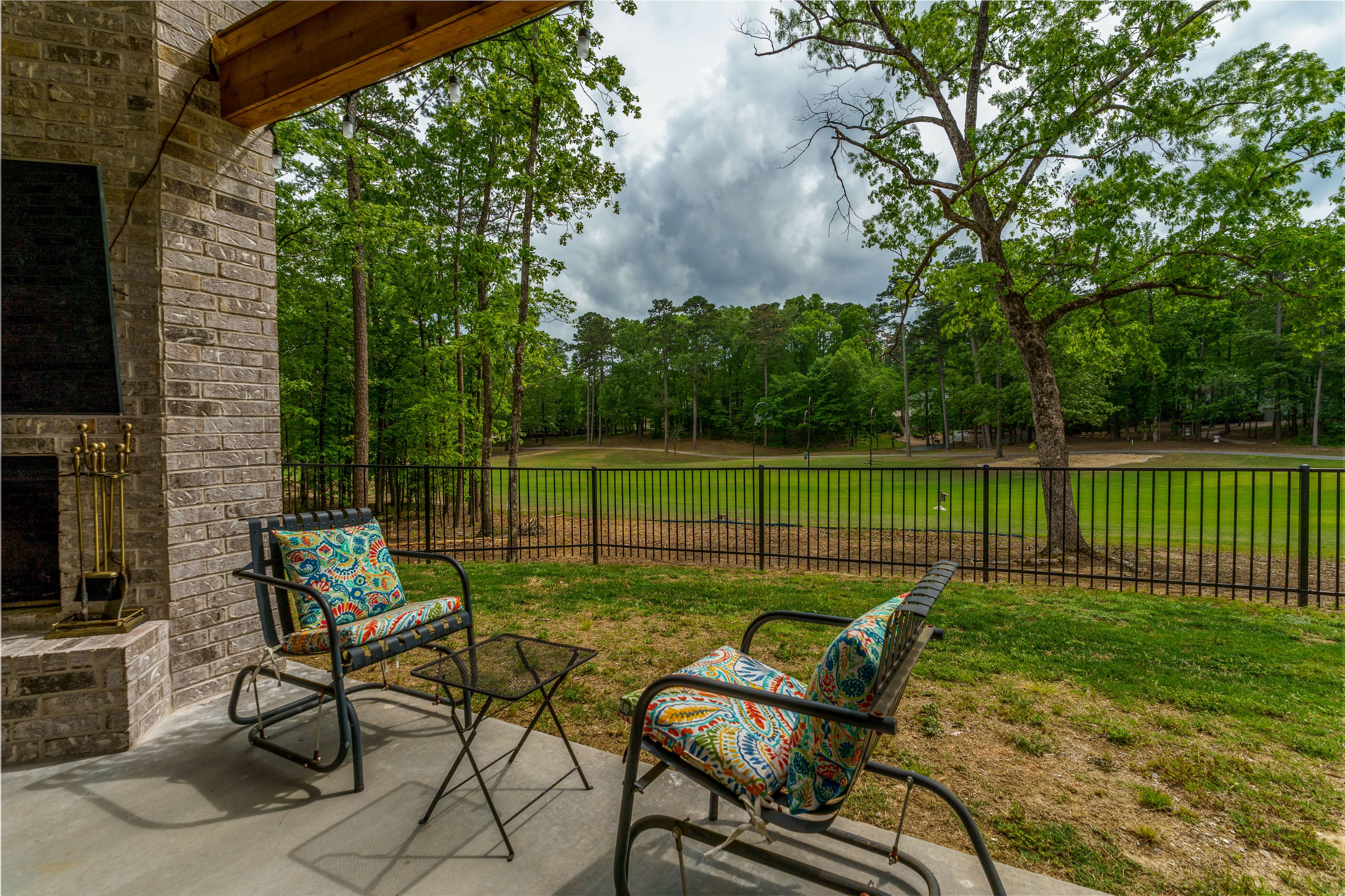 Covered Patio | Outdoor TV & Fireplace | Golf Course Views