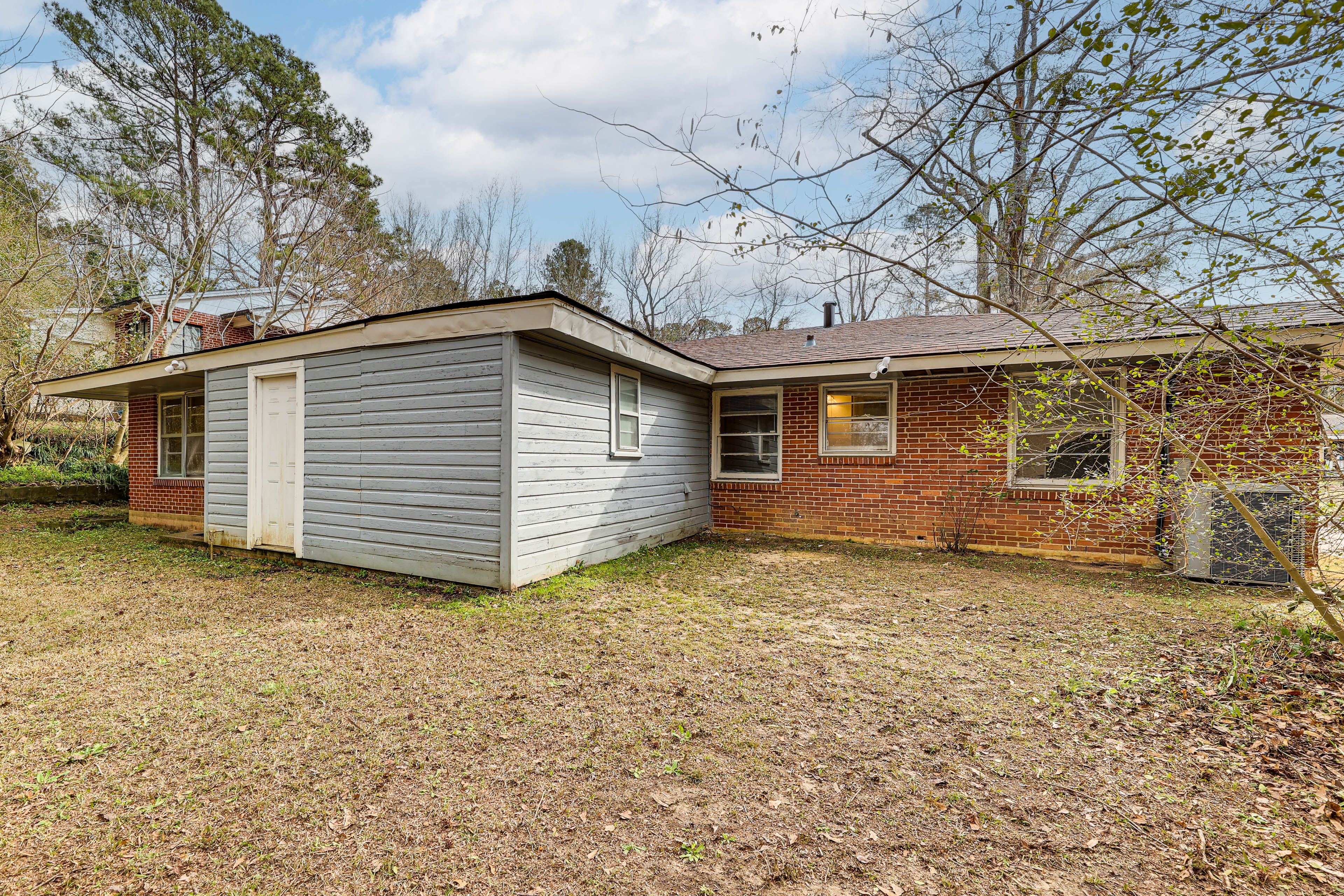 Back Exterior | Forested Setting