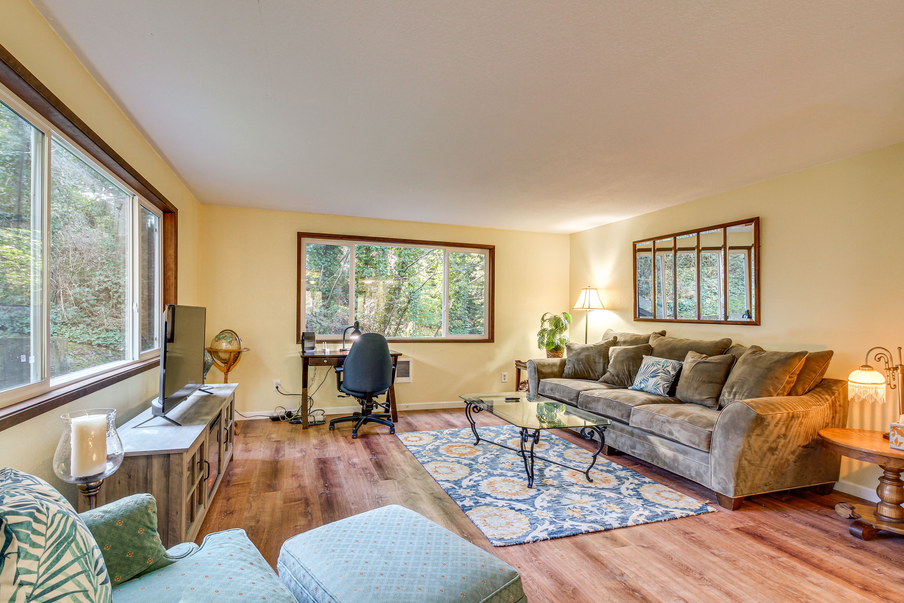 Living Room | Fireplace | Dedicated Workspace | 1st Floor