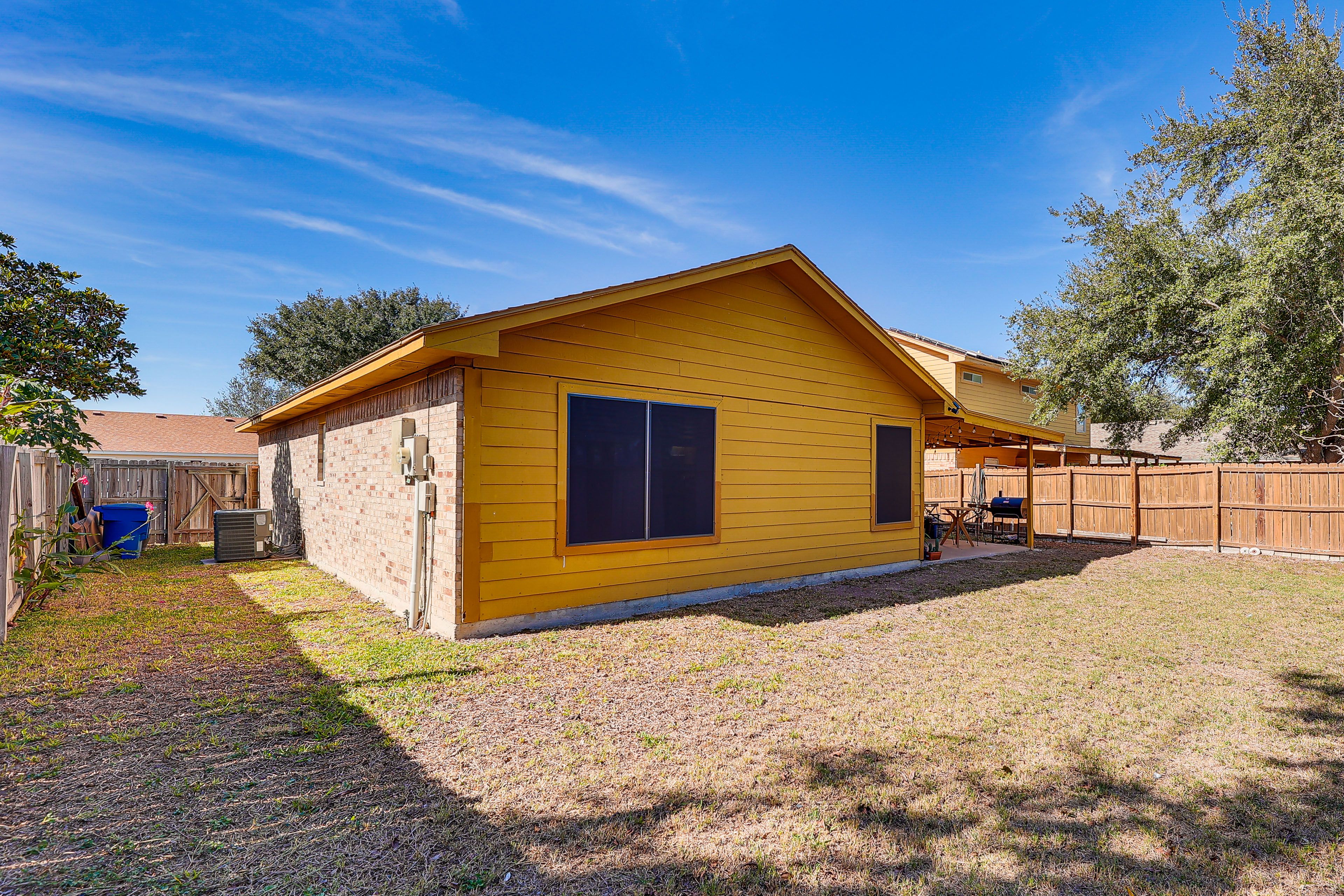 Back Exterior | Fully Fenced Yard | Covered Patio