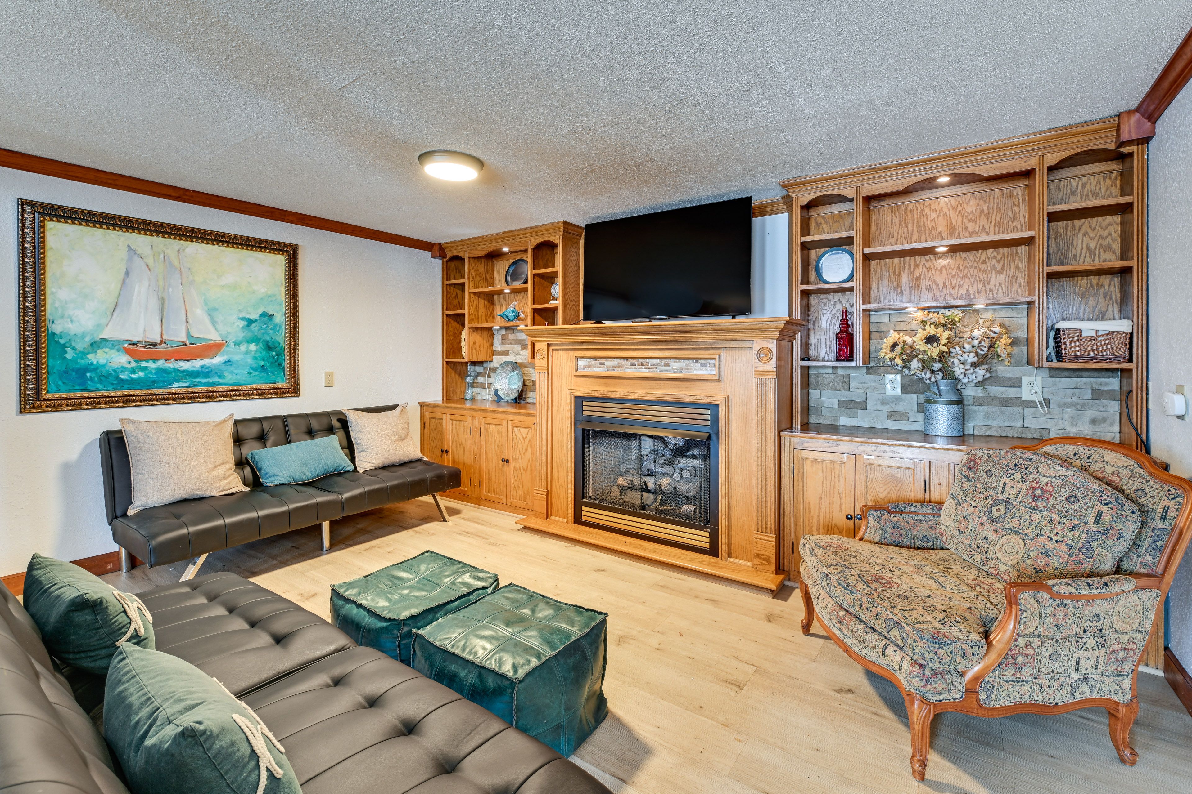 Living Room | Seasonal Fireplace | 2 Full Futons | Lower Level