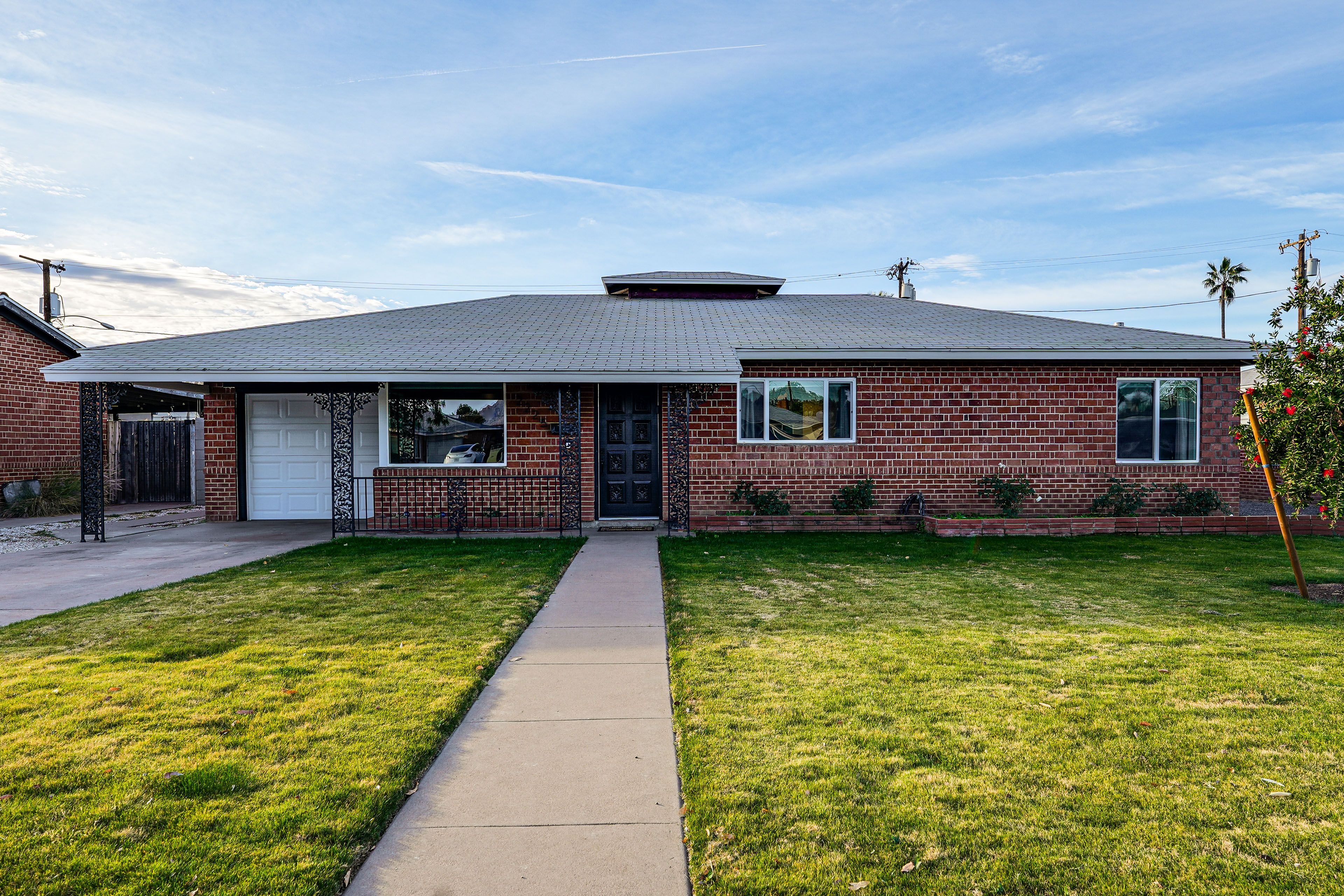 Front Exterior | Single-Story Home | Small Half Step to Access