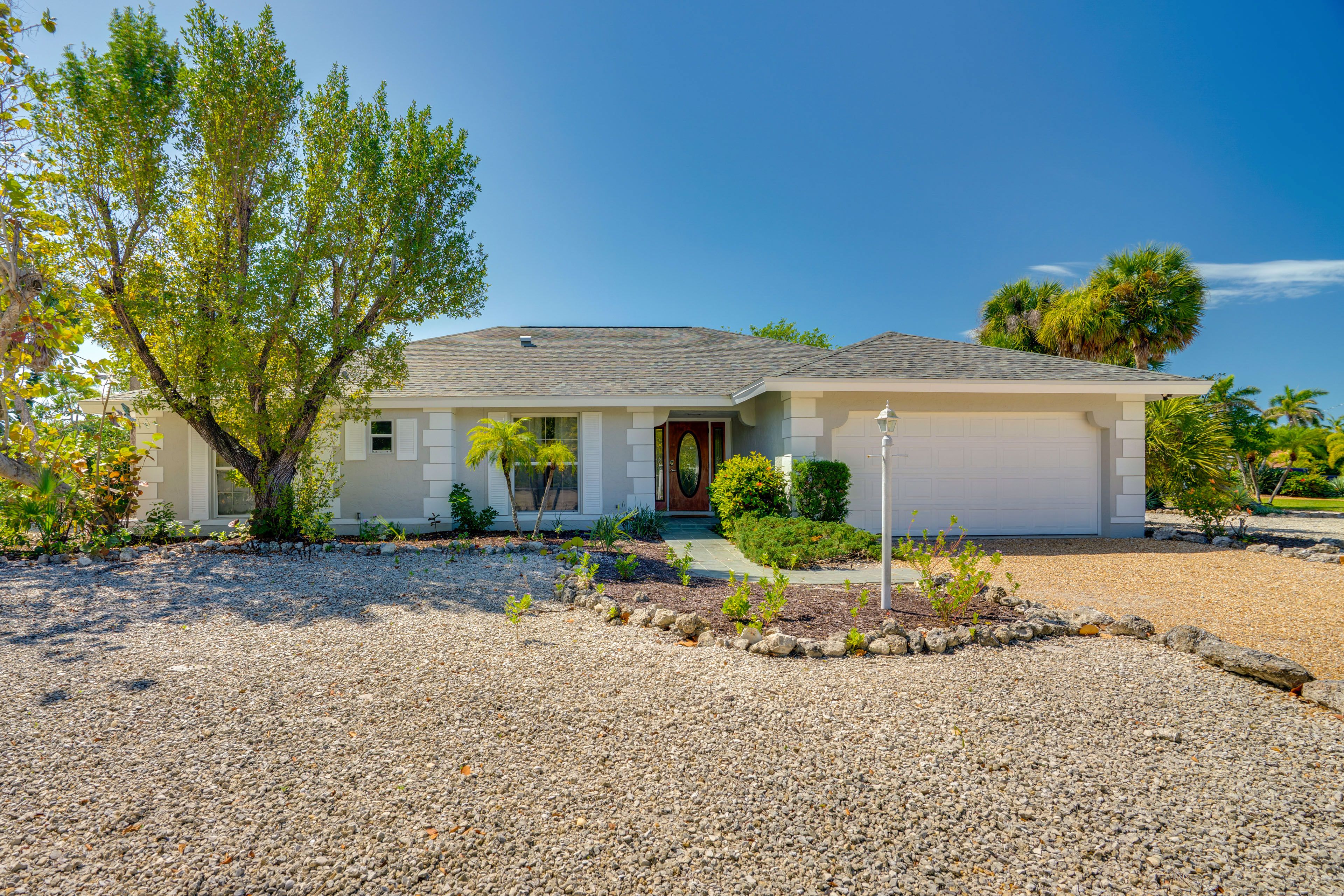 Property Exterior | Screened-In Lanai