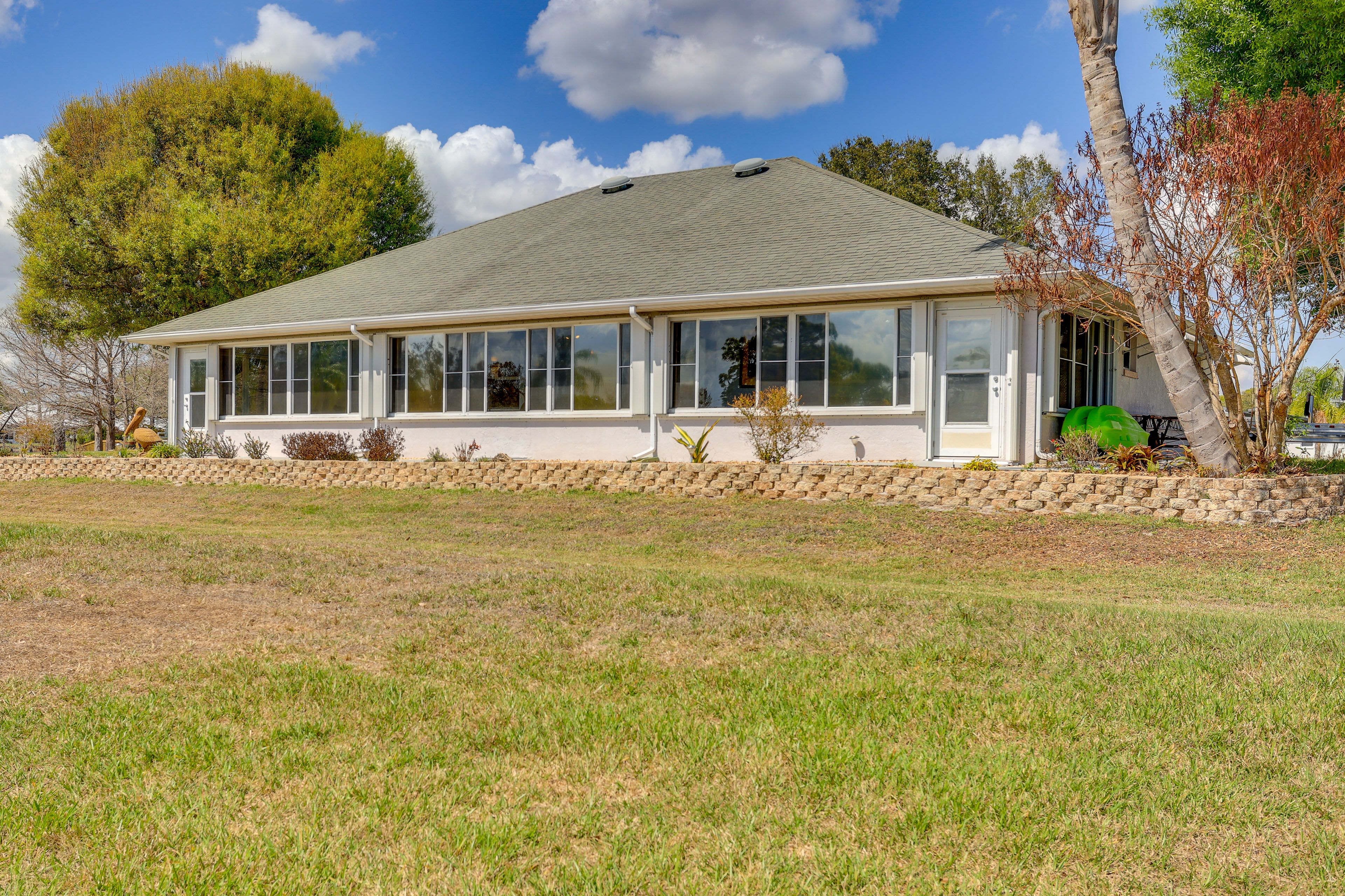 Exterior | Spacious Yard | Hammock | Outdoor Seating | Lake Views