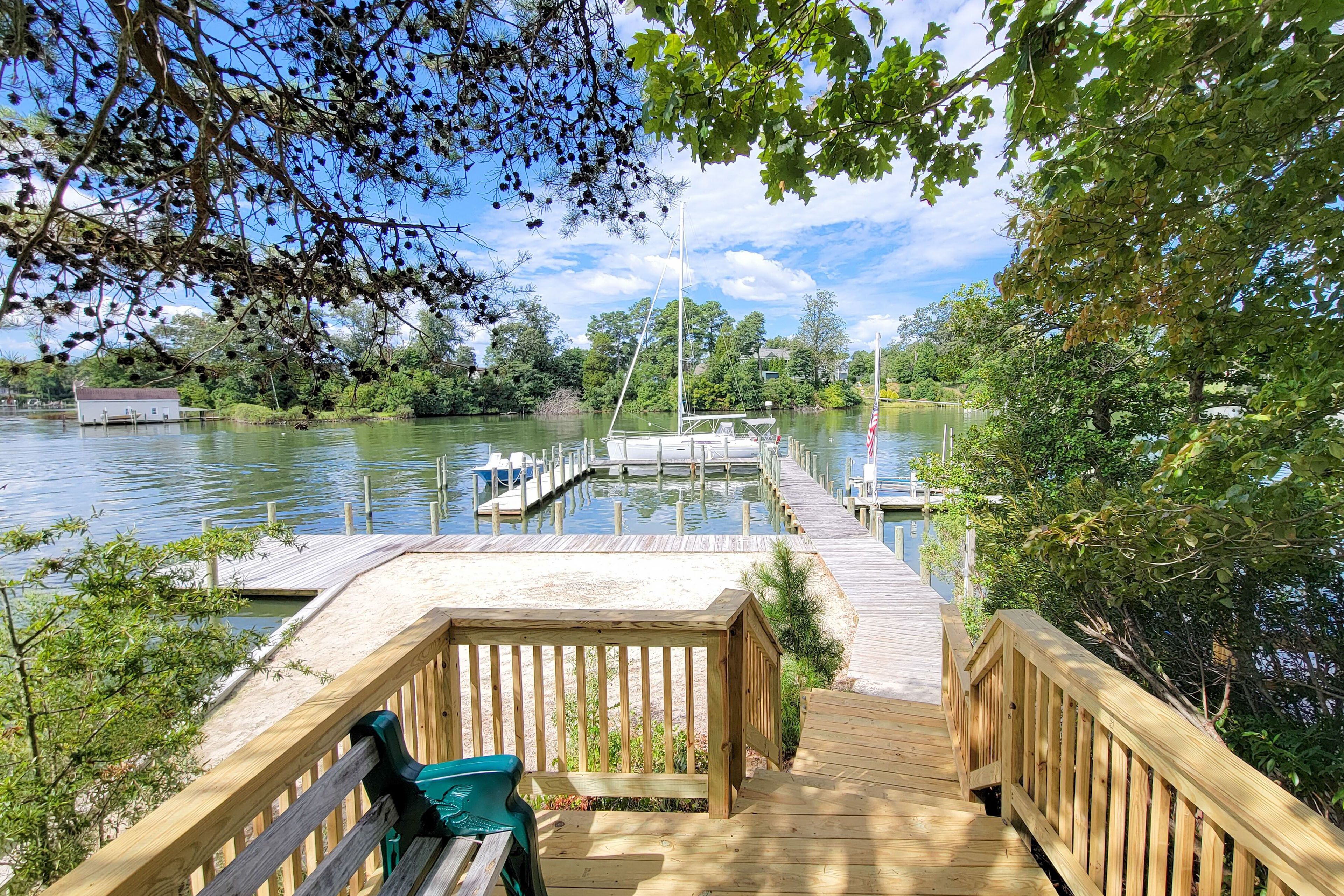 Staircase Landing Above Private Beach and Dock