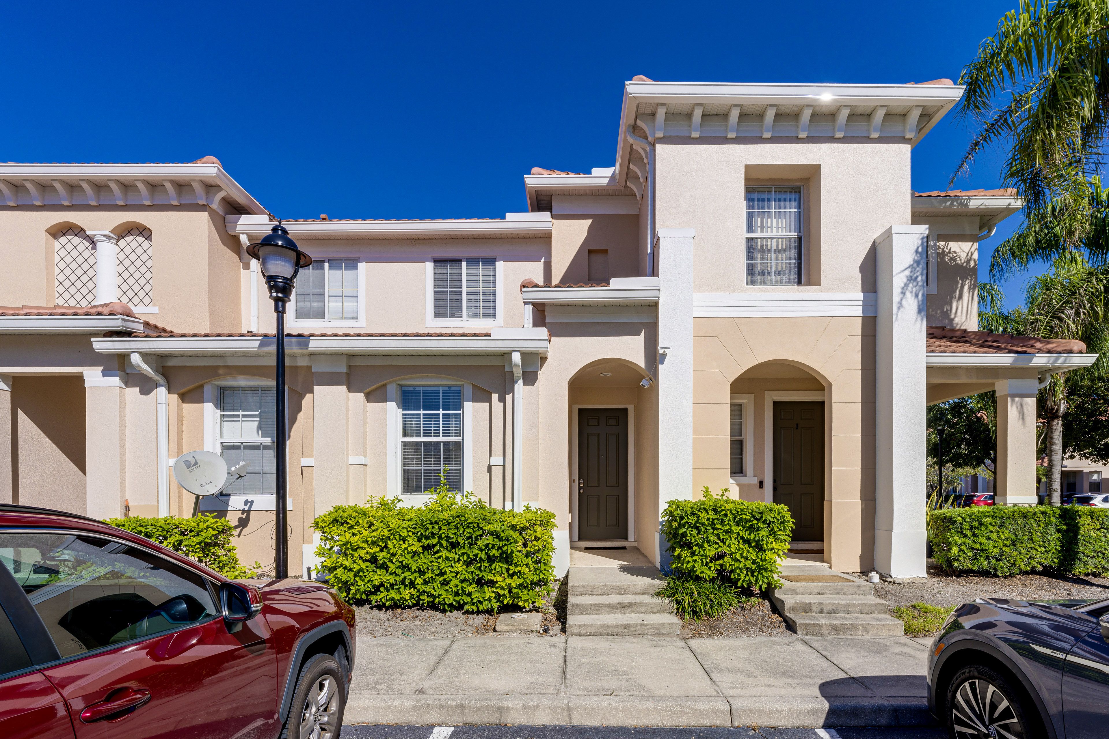 Townhouse Exterior | Designated Parking Spaces (2 Vehicles)