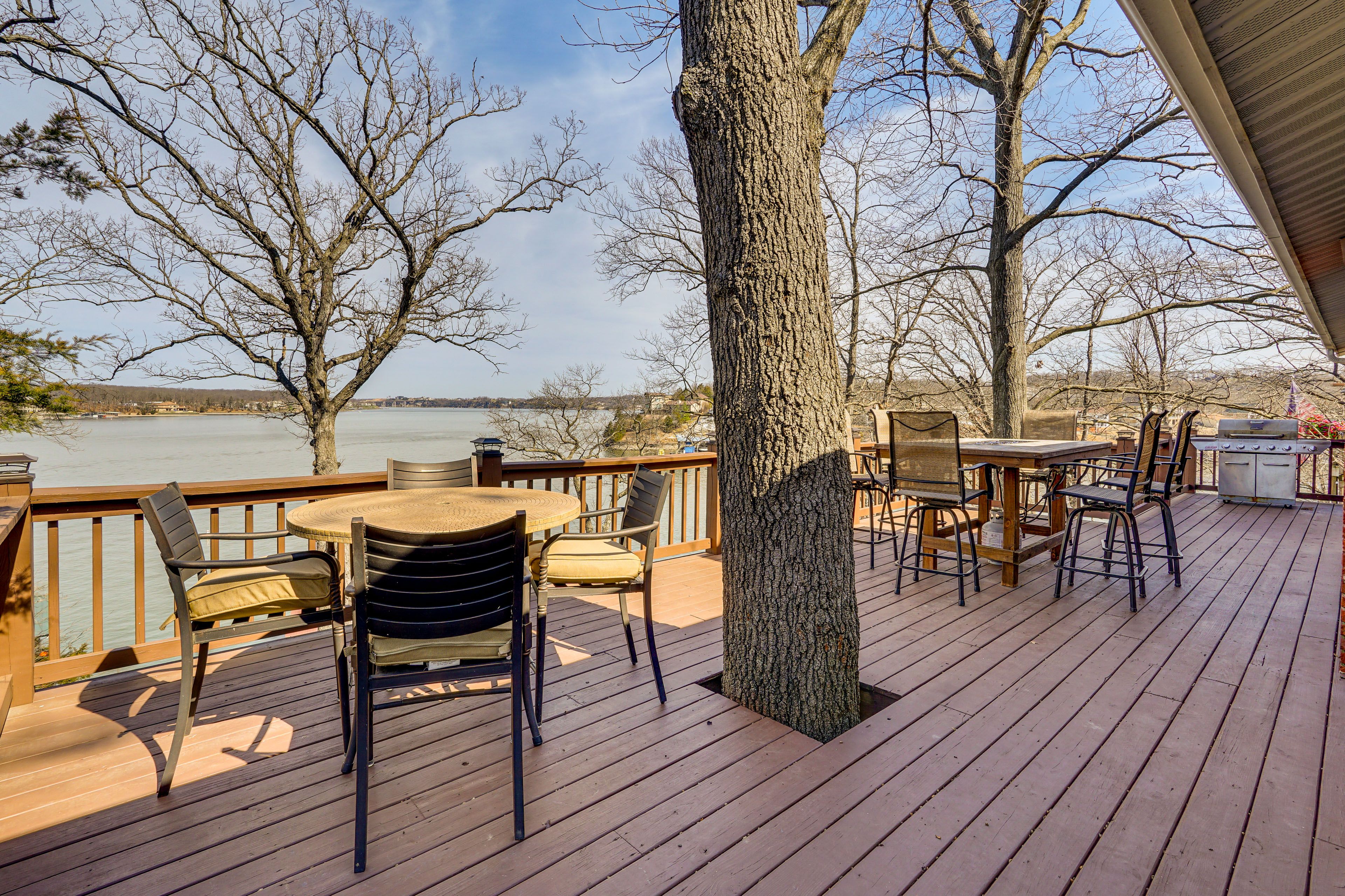 Deck w/ Dining Table | Covered Patio w/ Seating | Private Dock