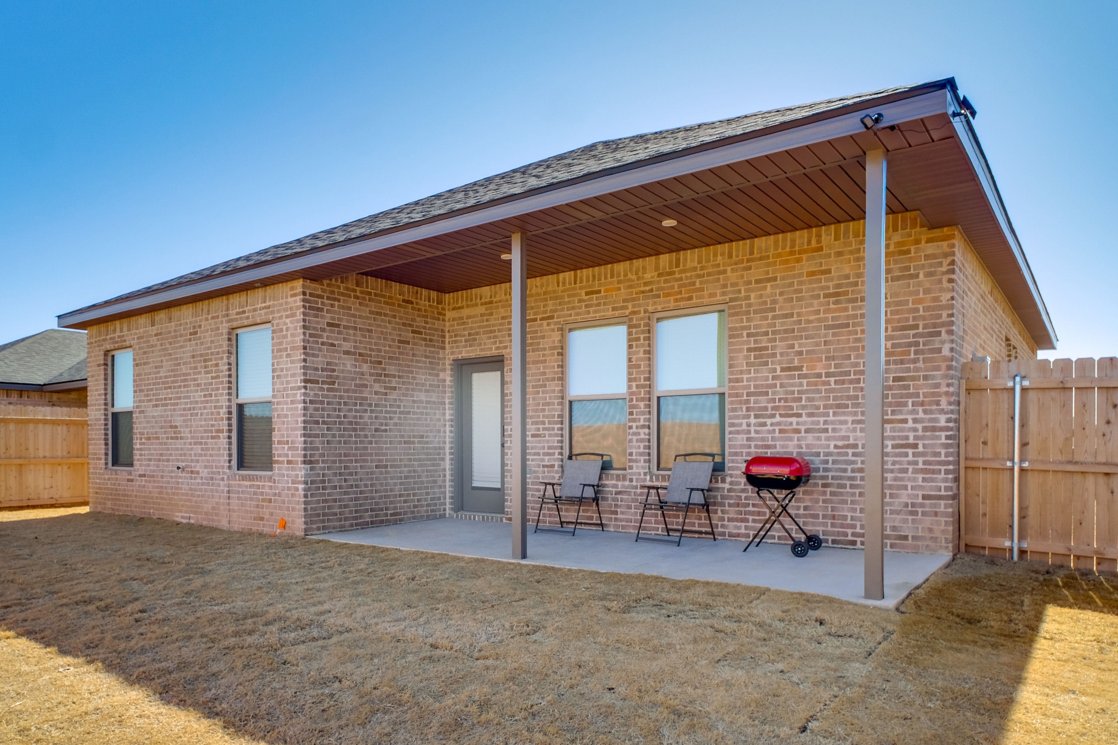 Covered Patio | Charcoal Grill | Fenced Backyard