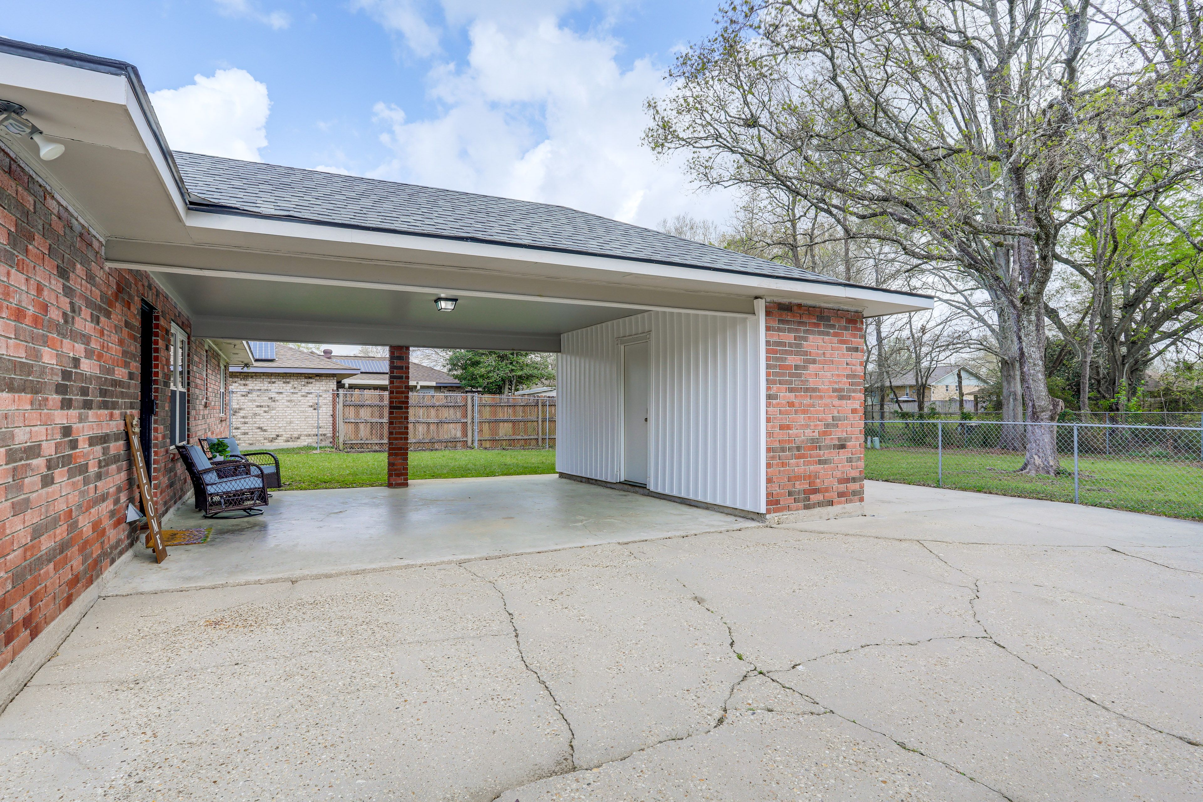 Exterior | Carport Parking & Patio Area