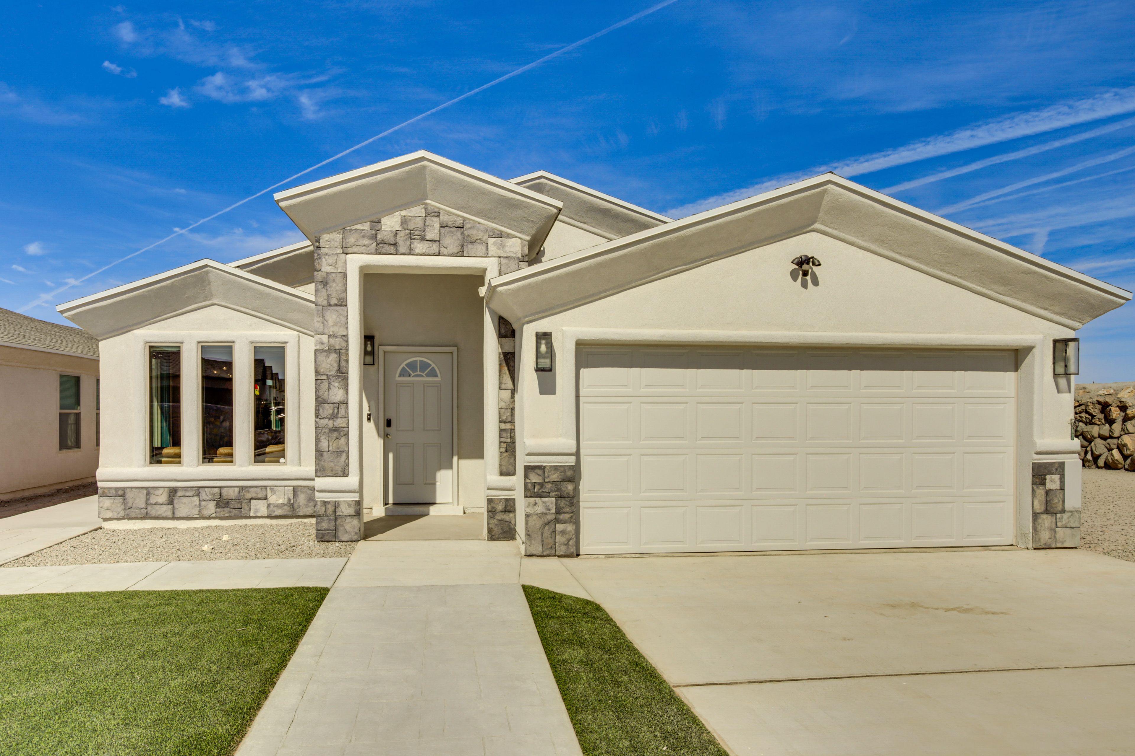 Property Exterior | Garage (2 Vehicles) | Driveway (2 Vehicles)