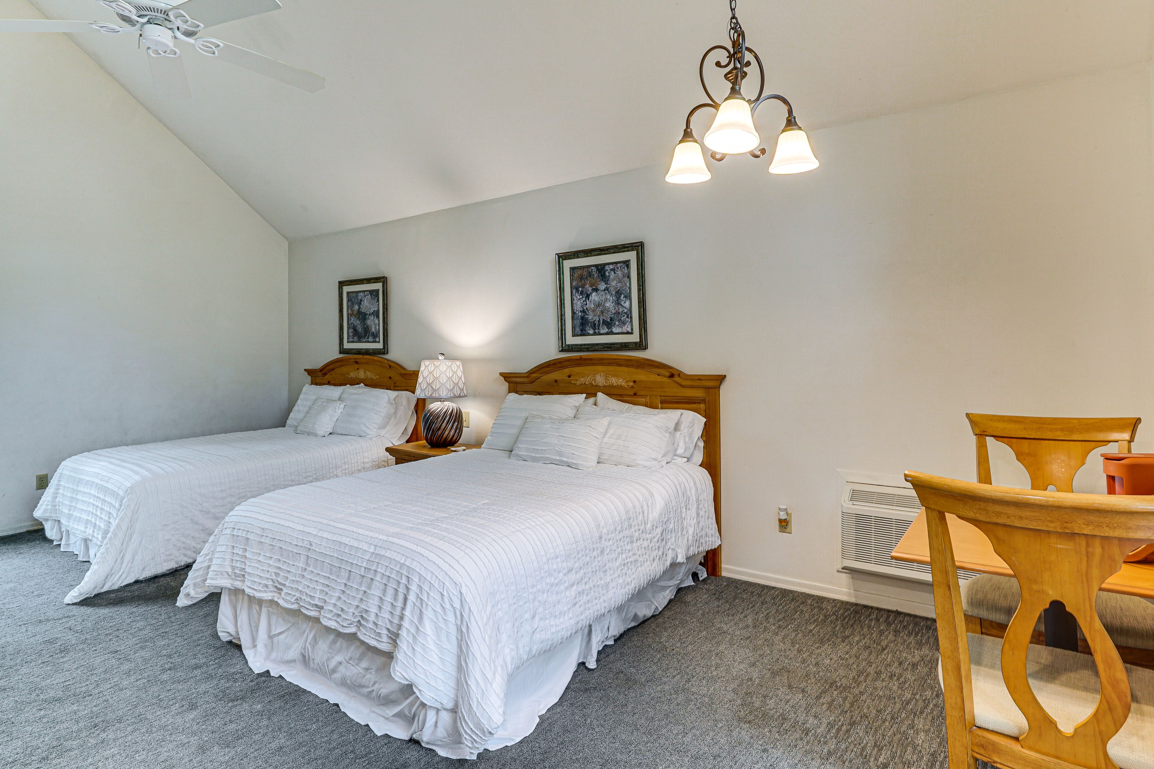 Bedroom 2 | 2 Queen Beds | En-Suite Bathroom | Balcony Access | Main Floor