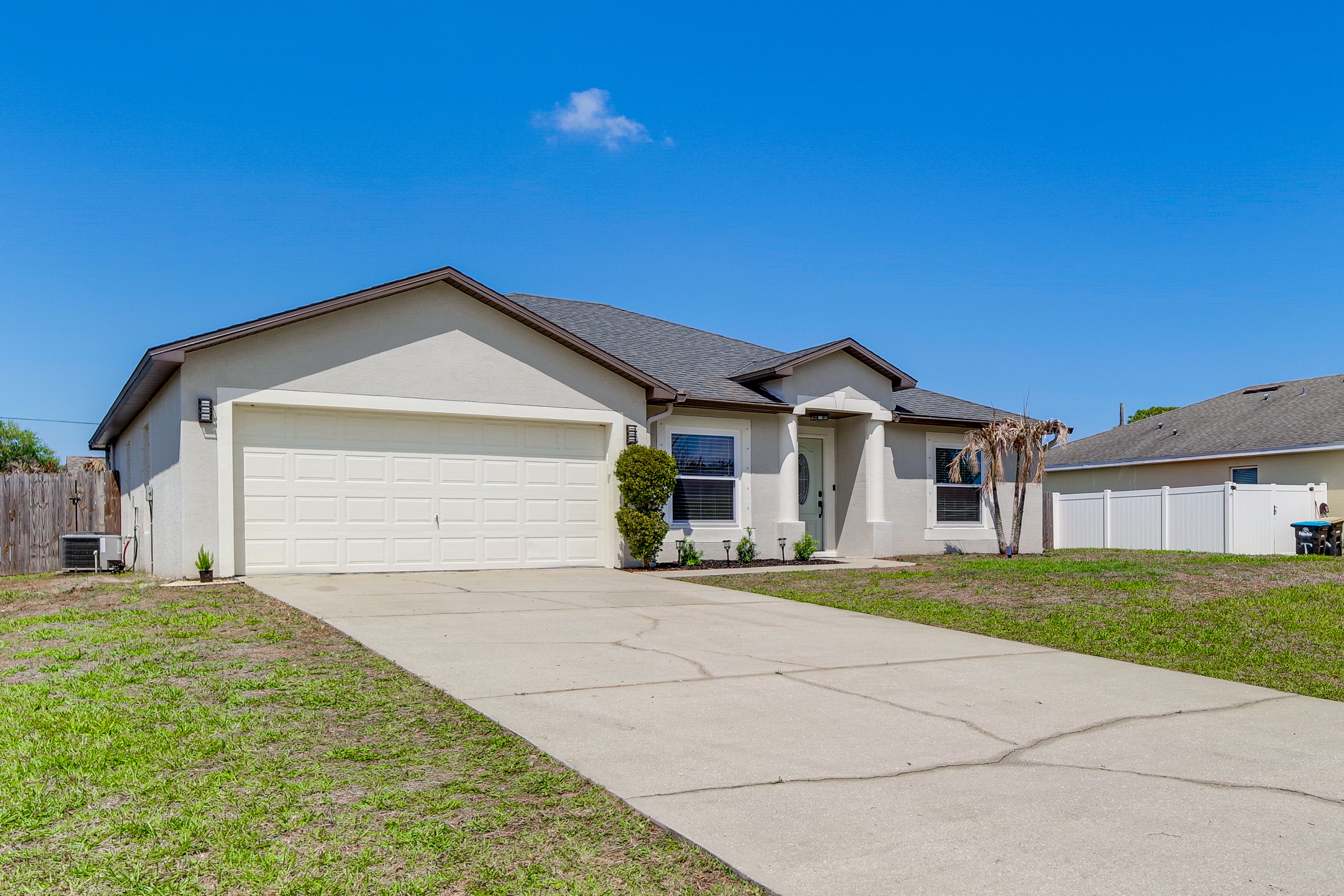 Parking | Driveway (4 Vehicles) | Free Street Parking (First-Come, First-Served)