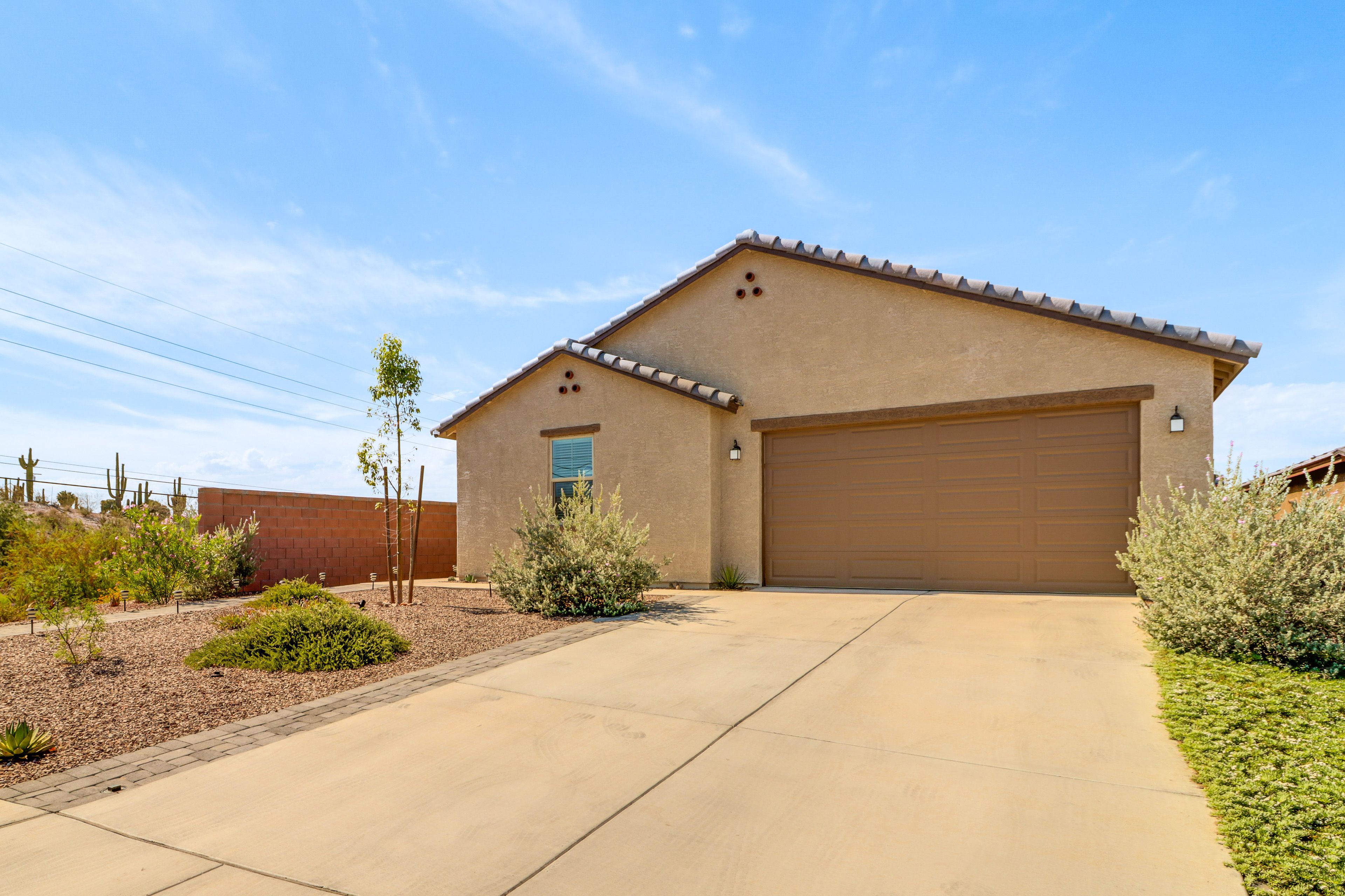 Parking | Garage (2 Vehicles) | Driveway (2 Vehicles) | EV Charger