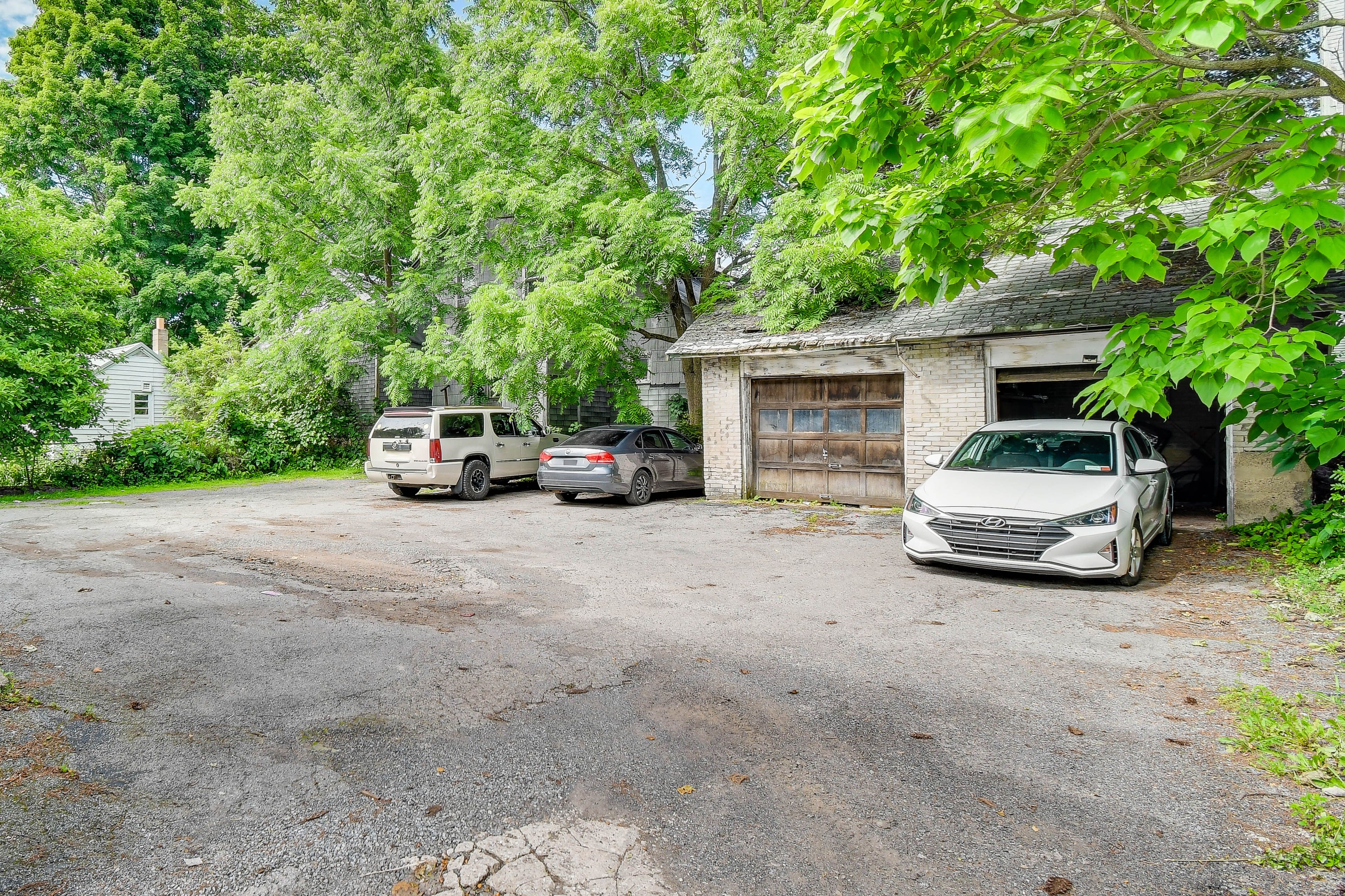 Parking | Shared Lot (1 Vehicle Max, First-Come, First-Served)