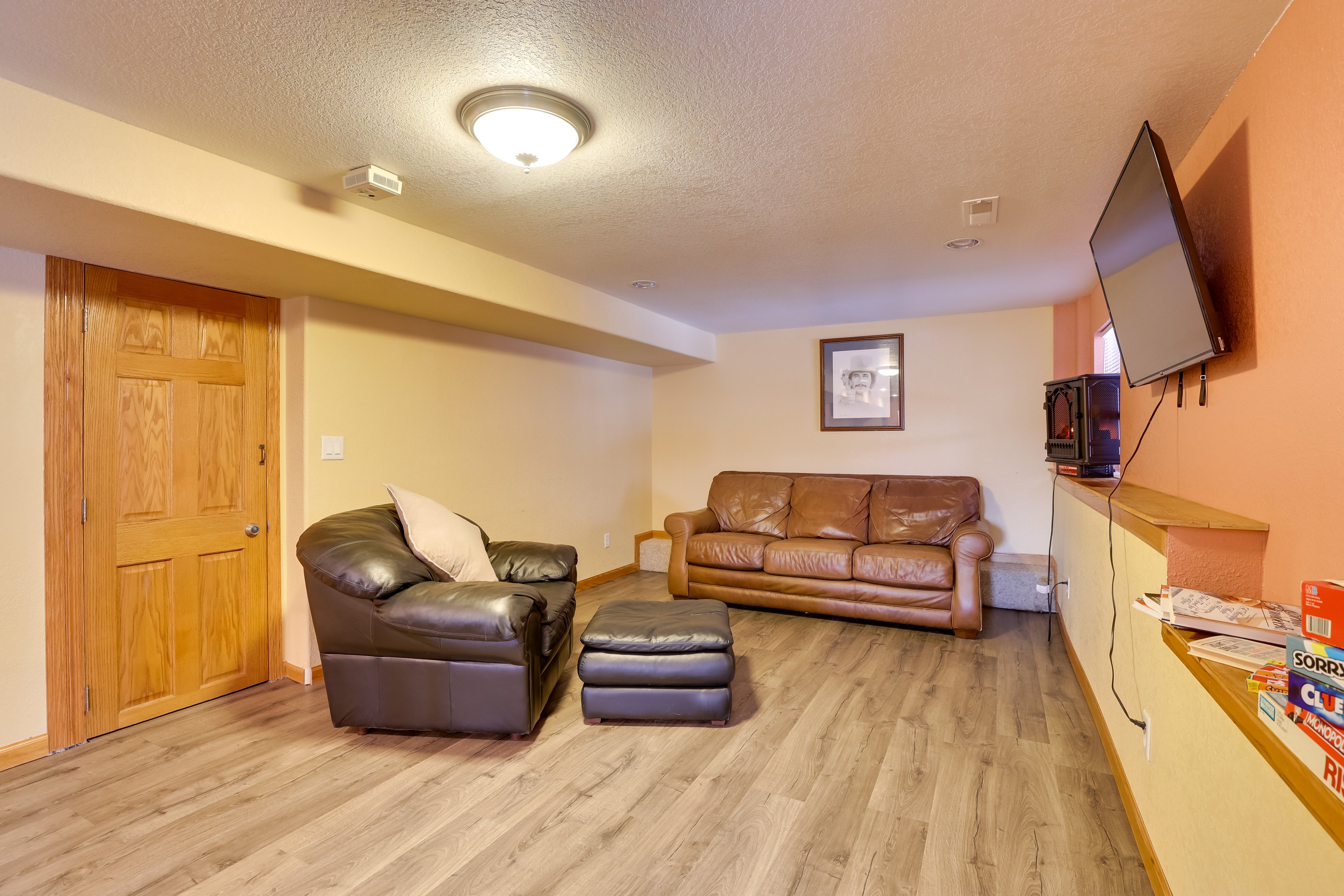 Basement-Level Living Room | Queen Sleeper Sofa