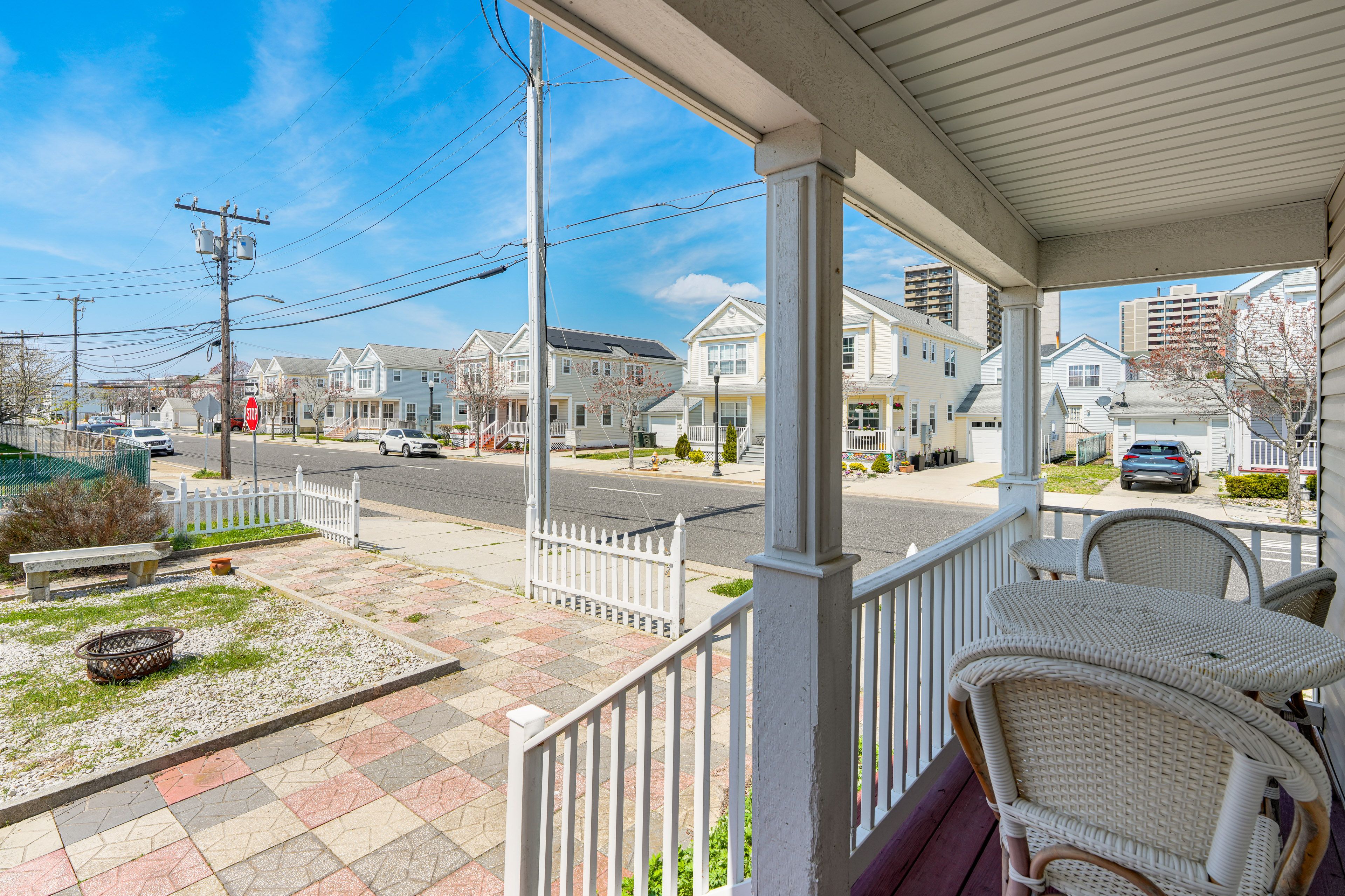 Covered Porch w/ Dining Set | Fire Pit