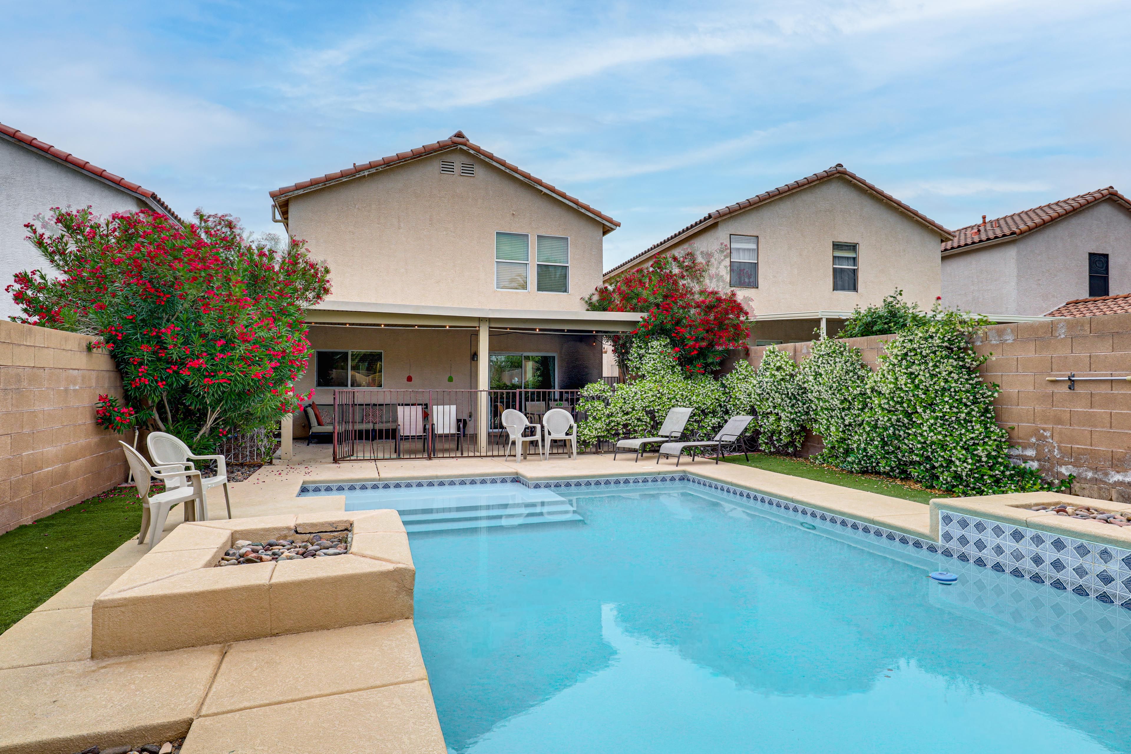 Las Vegas Vacation Rental | 4BR | 2.5BA | 2,750 Sq Ft | Threshold Step to Enter