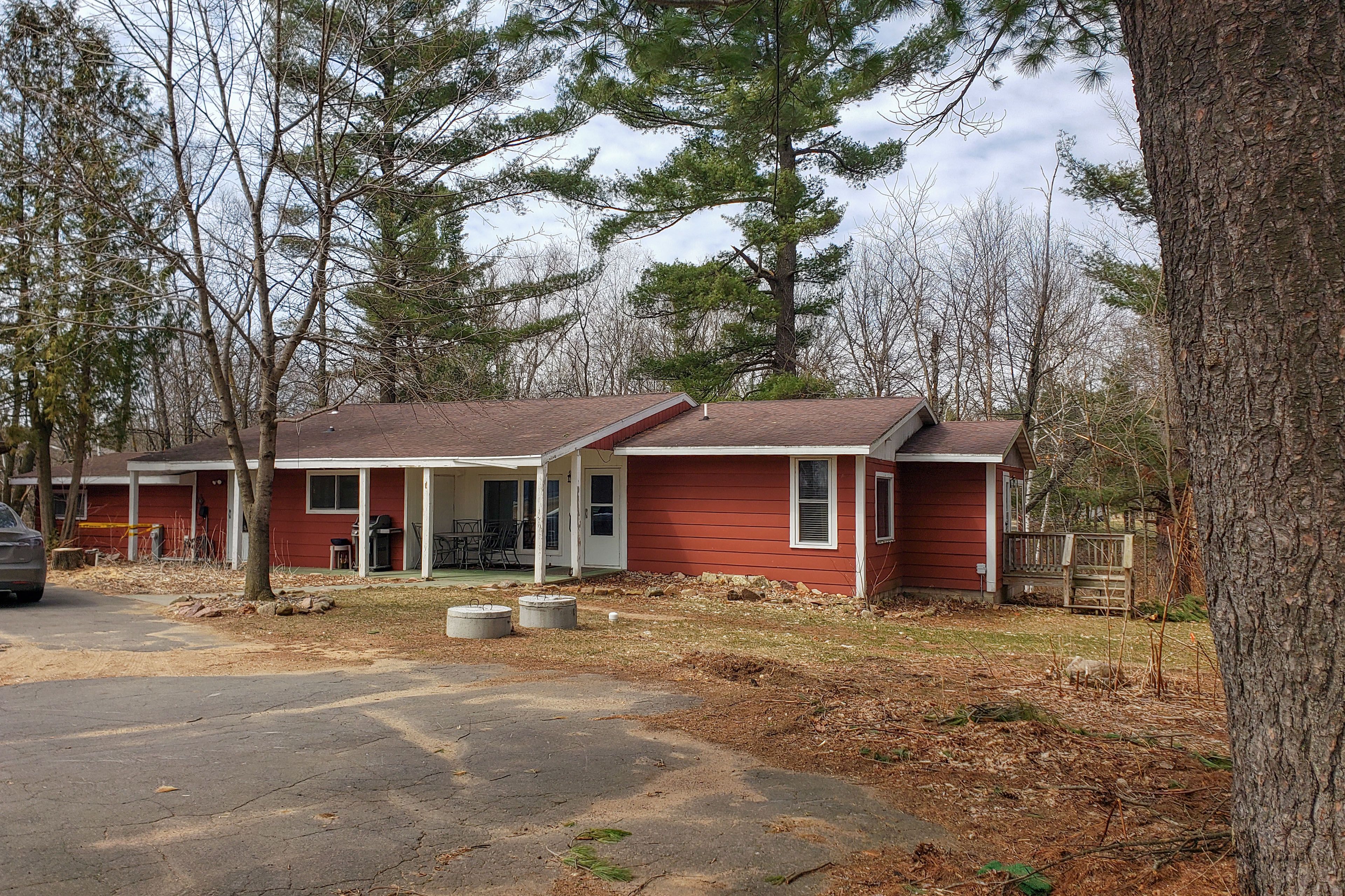 Property Exterior | Spacious Yard | 2 Wood-Burning Fire Pits