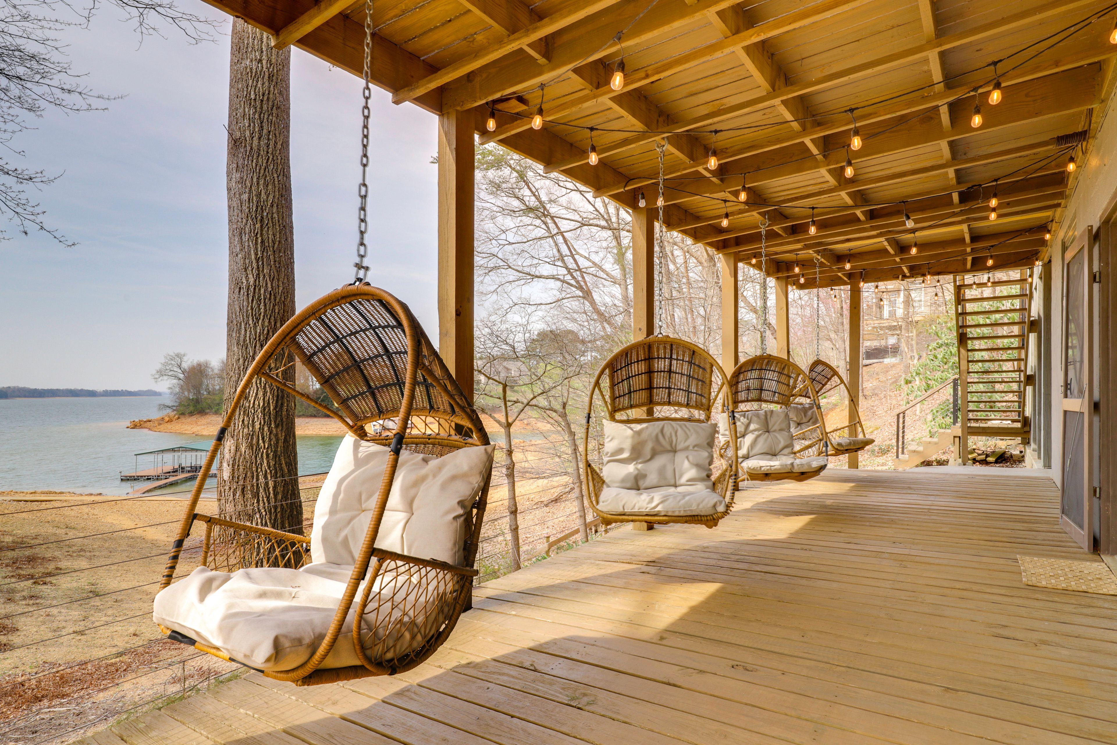 Covered Patio | Swing Chairs | 2-Story Home